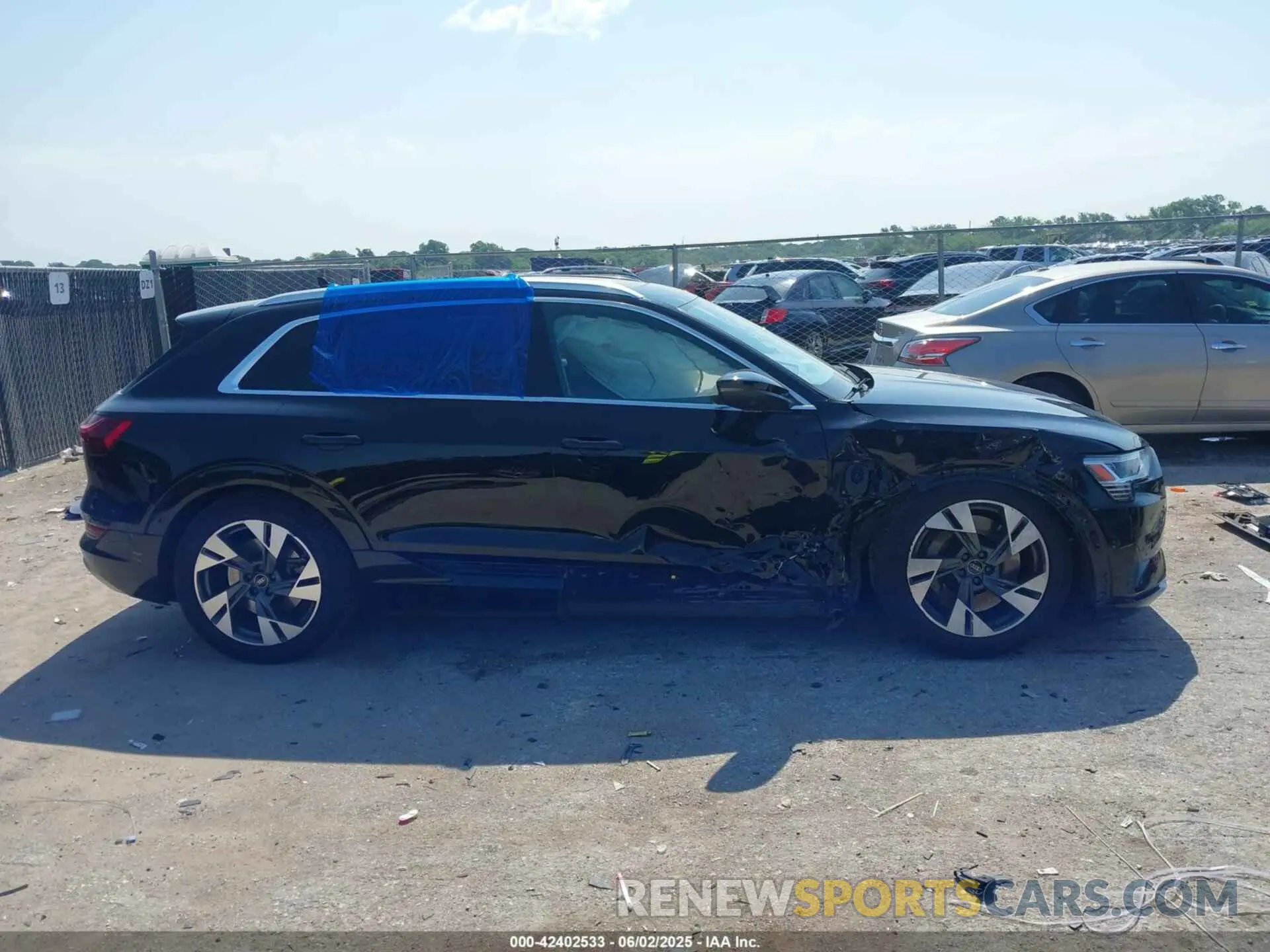 14 Photograph of a damaged car WA1LABGE6NB022565 AUDI E-TRON 2022
