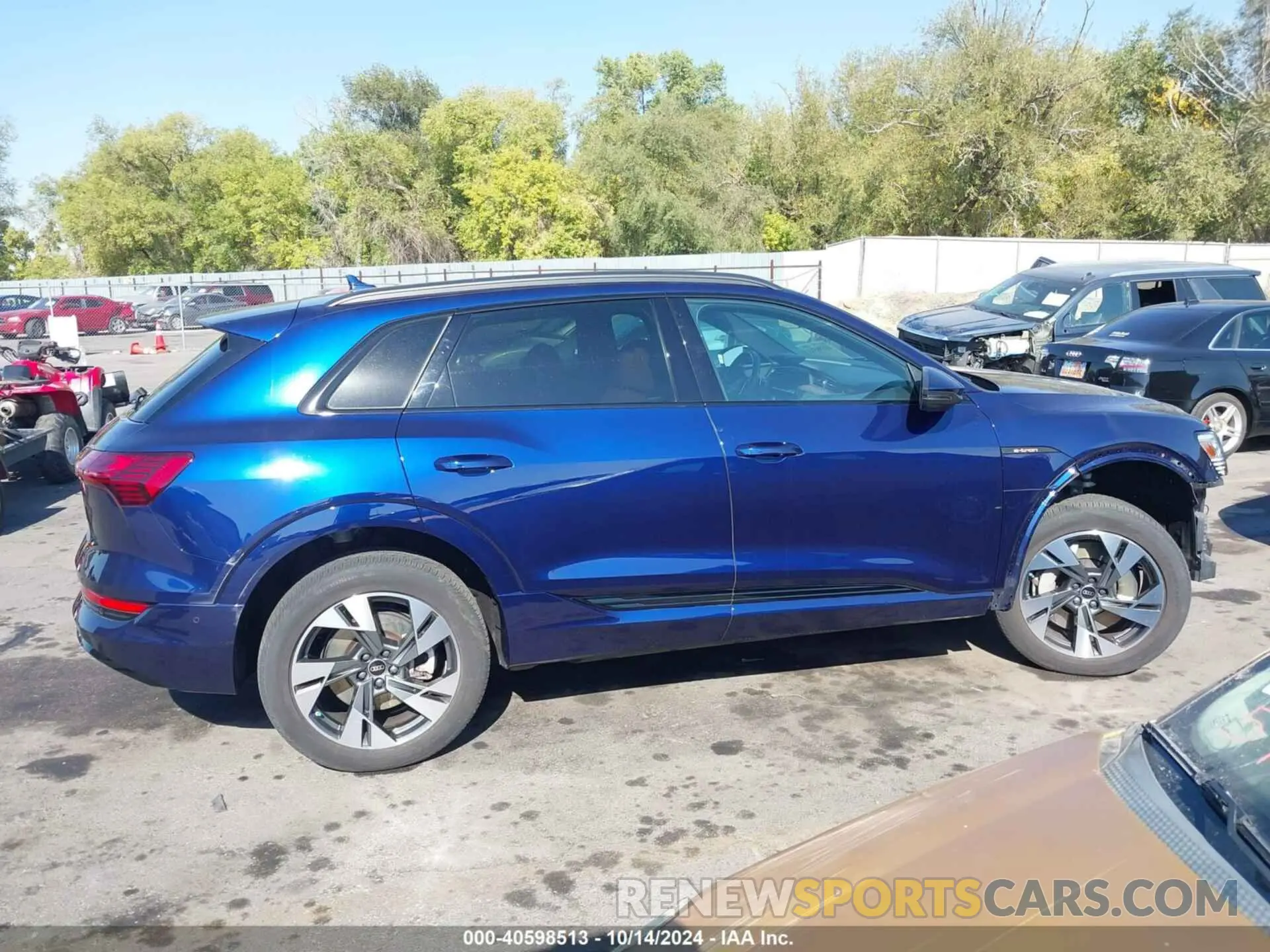 13 Photograph of a damaged car WA1AAAGE2PB014127 AUDI E-TRON 2023