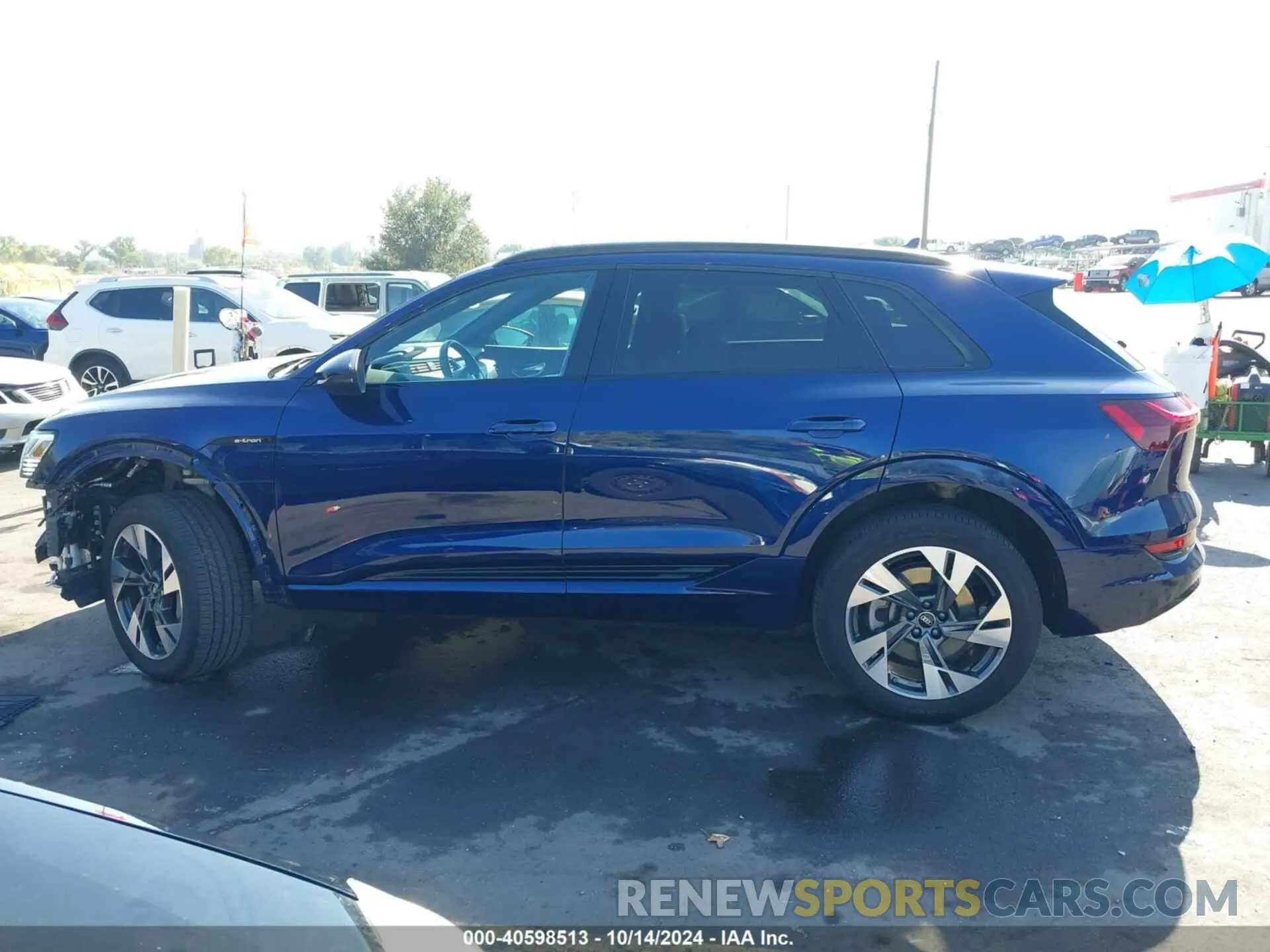 14 Photograph of a damaged car WA1AAAGE2PB014127 AUDI E-TRON 2023