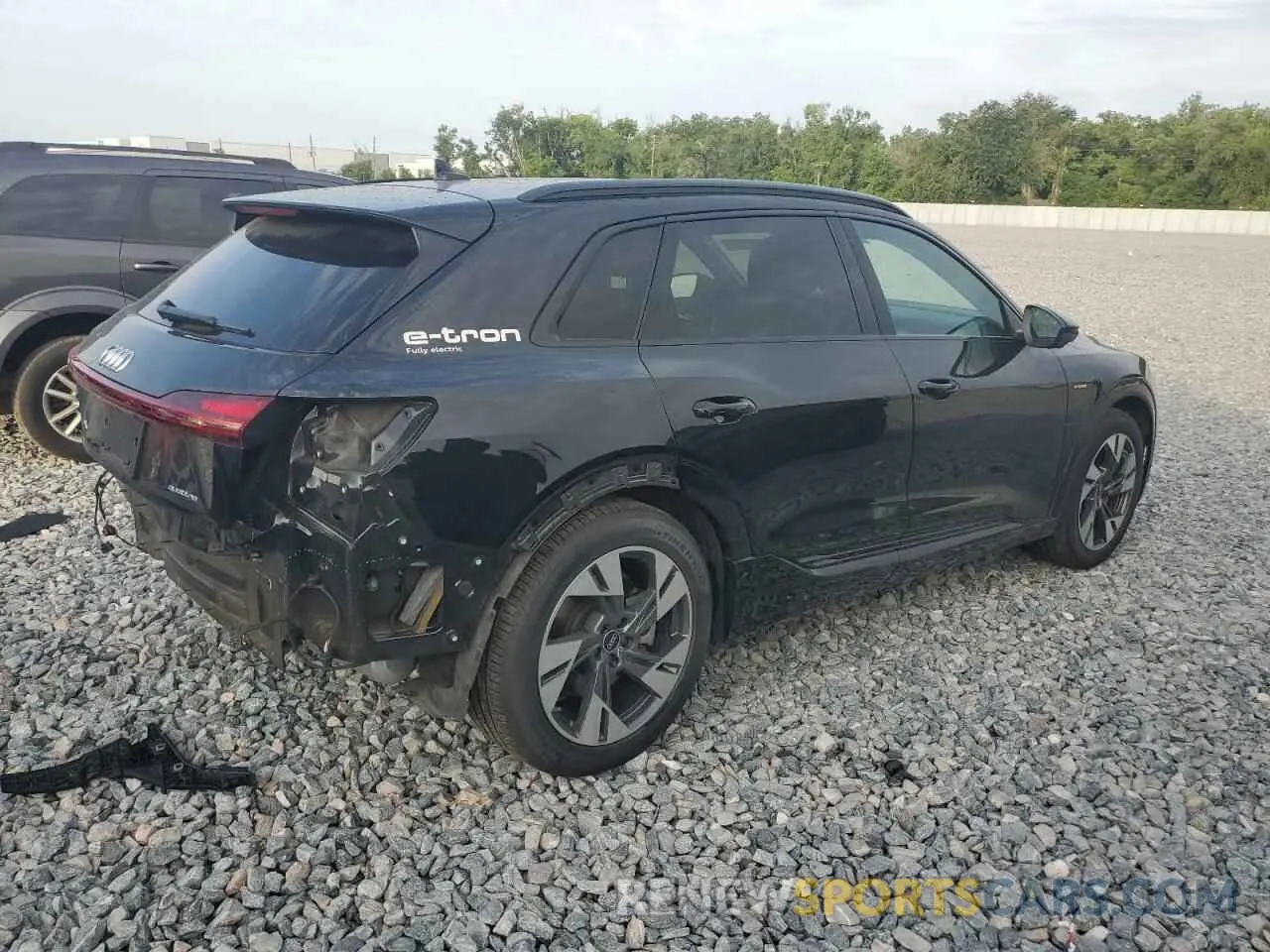 3 Photograph of a damaged car WA1AAAGE3PB025279 AUDI E-TRON 2023
