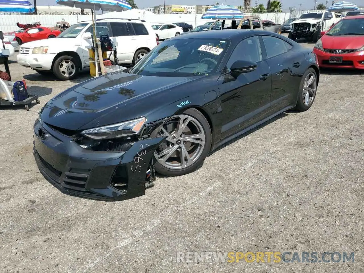 1 Photograph of a damaged car WAUDJBFWXP7003055 AUDI E-TRON GT 2023