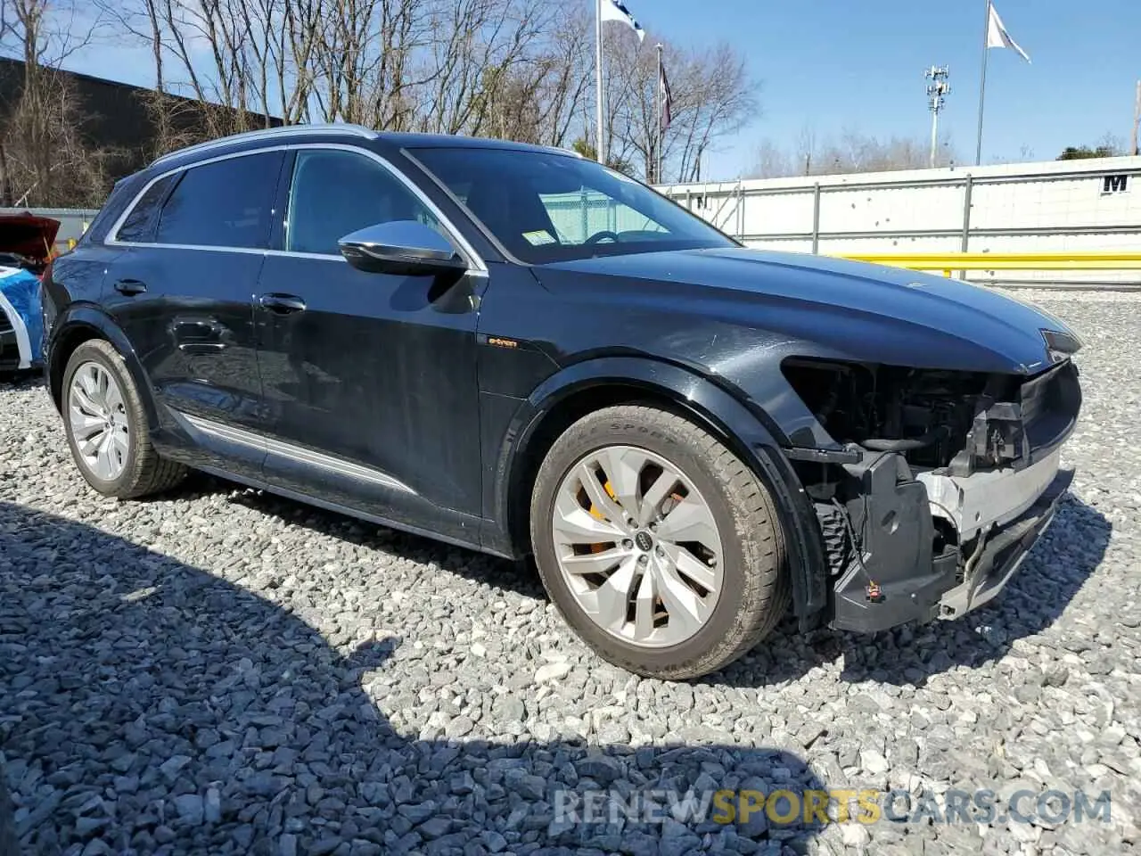 4 Photograph of a damaged car WA1ACBGE0NB038956 AUDI E-TRON S P 2022