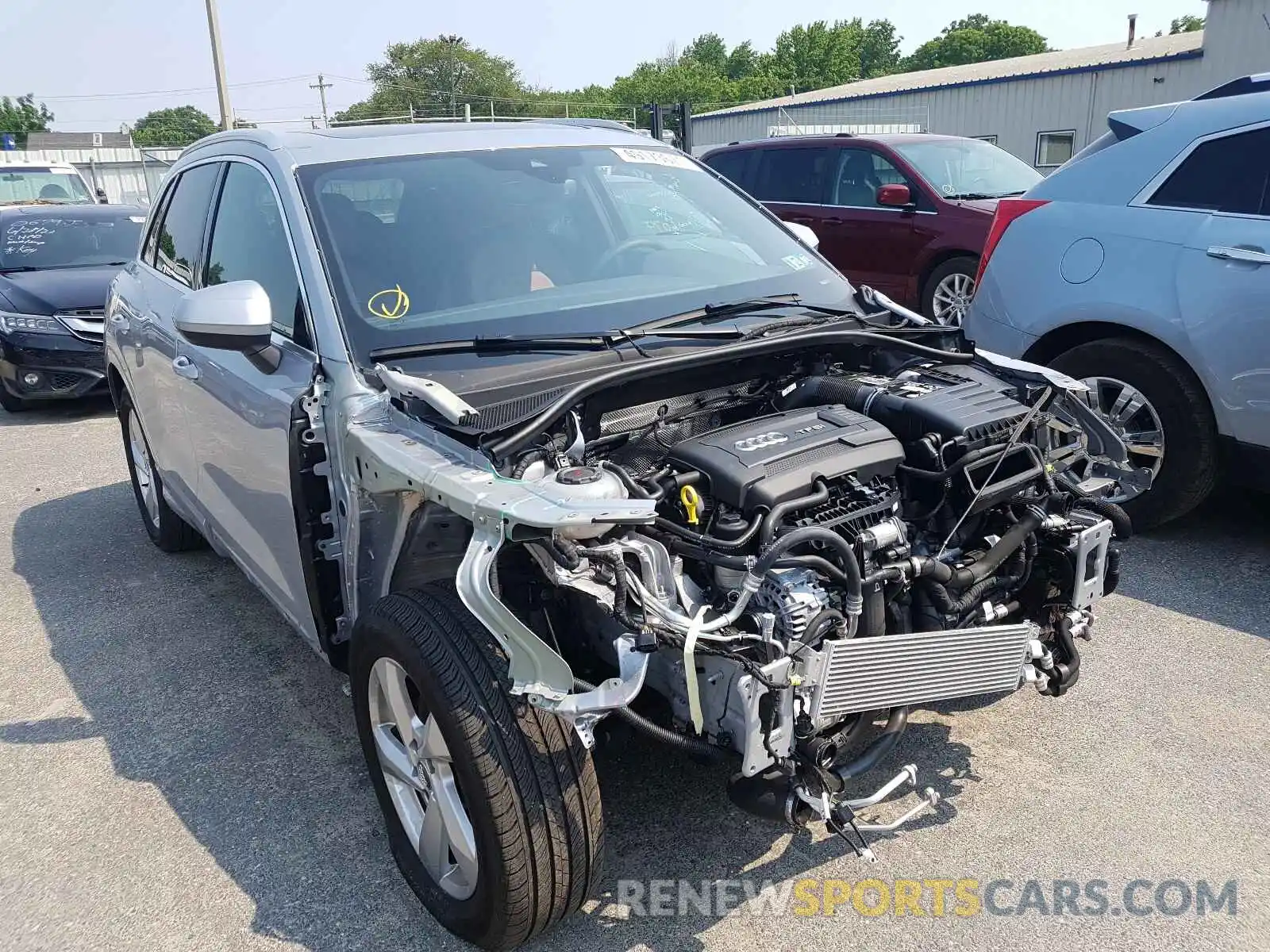 1 Photograph of a damaged car WA1BECF37K1067201 AUDI Q3 2019