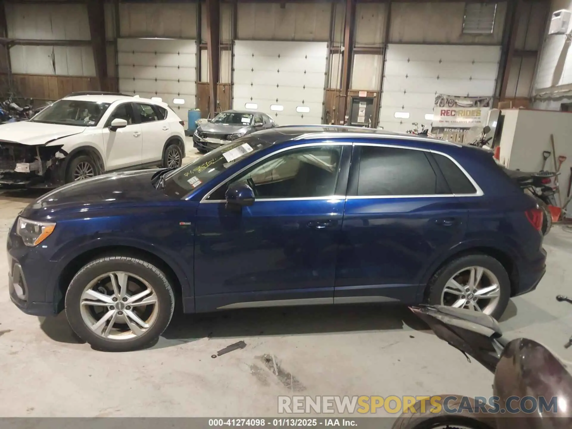 14 Photograph of a damaged car WA1DECF31M1011315 AUDI Q3 2021
