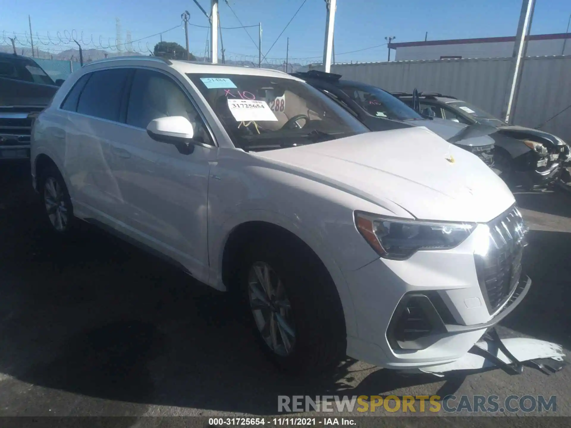 1 Photograph of a damaged car WA1DECF37M1009665 AUDI Q3 2021