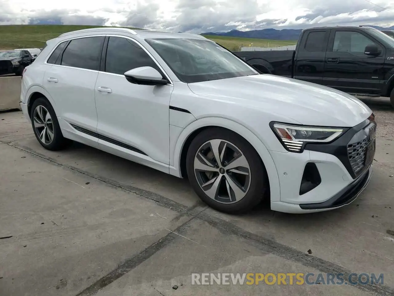 4 Photograph of a damaged car WA15AAGE0RB007827 AUDI Q8 E-TRON 2024