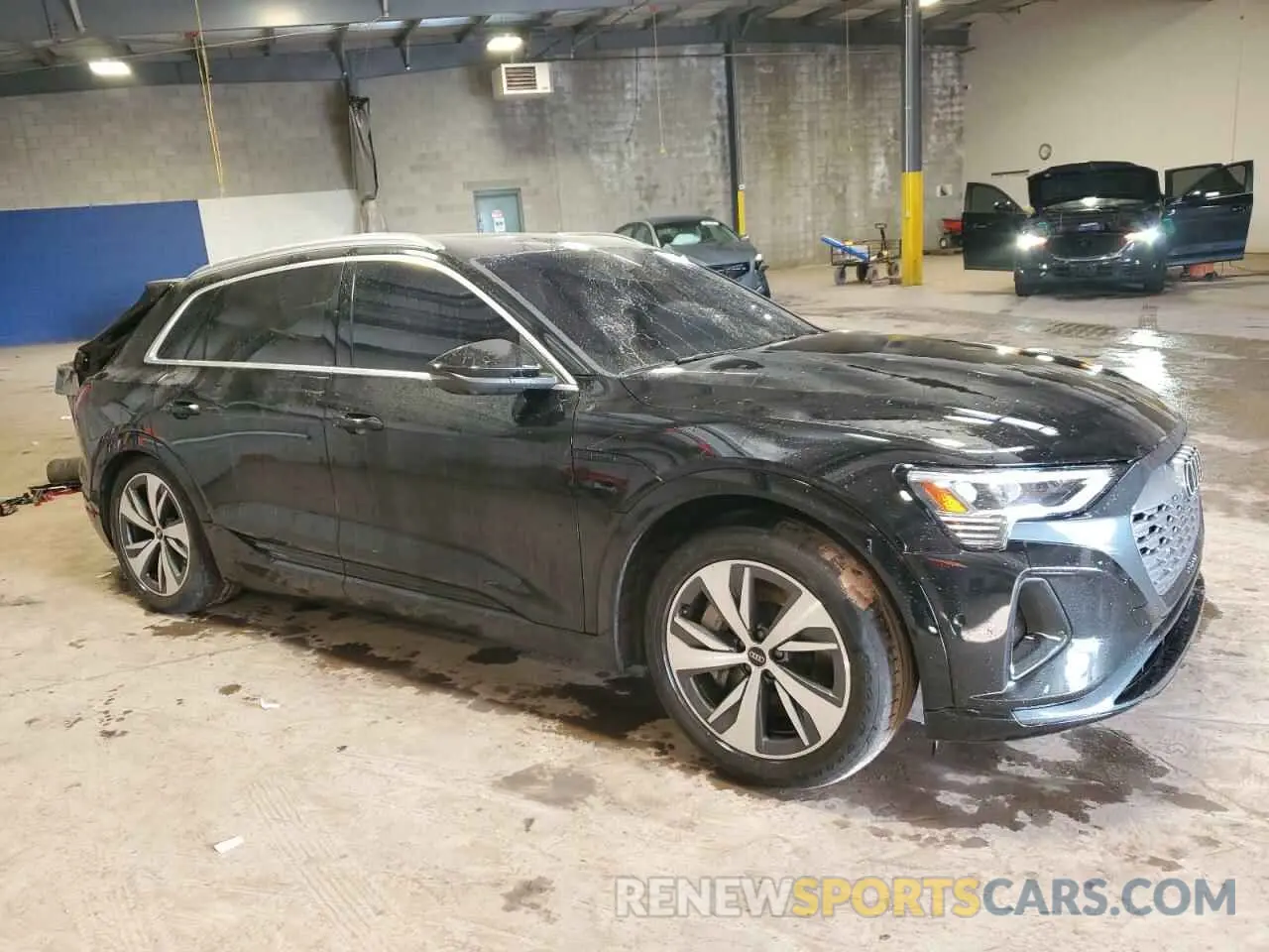 4 Photograph of a damaged car WA15AAGE0RB016575 AUDI Q8 E-TRON 2024
