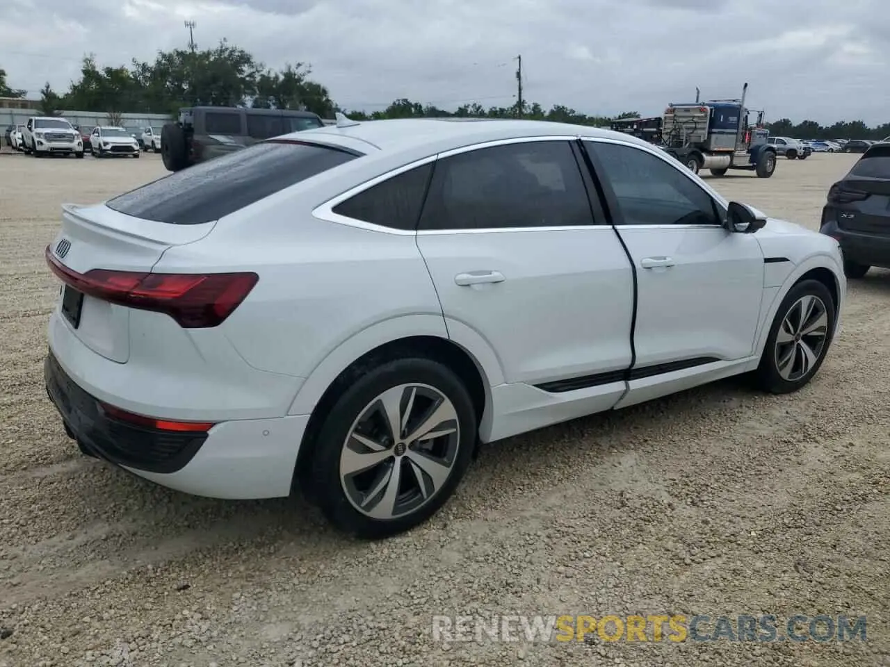3 Photograph of a damaged car WA1CAAGEXRB007065 AUDI Q8 E-TRON 2024