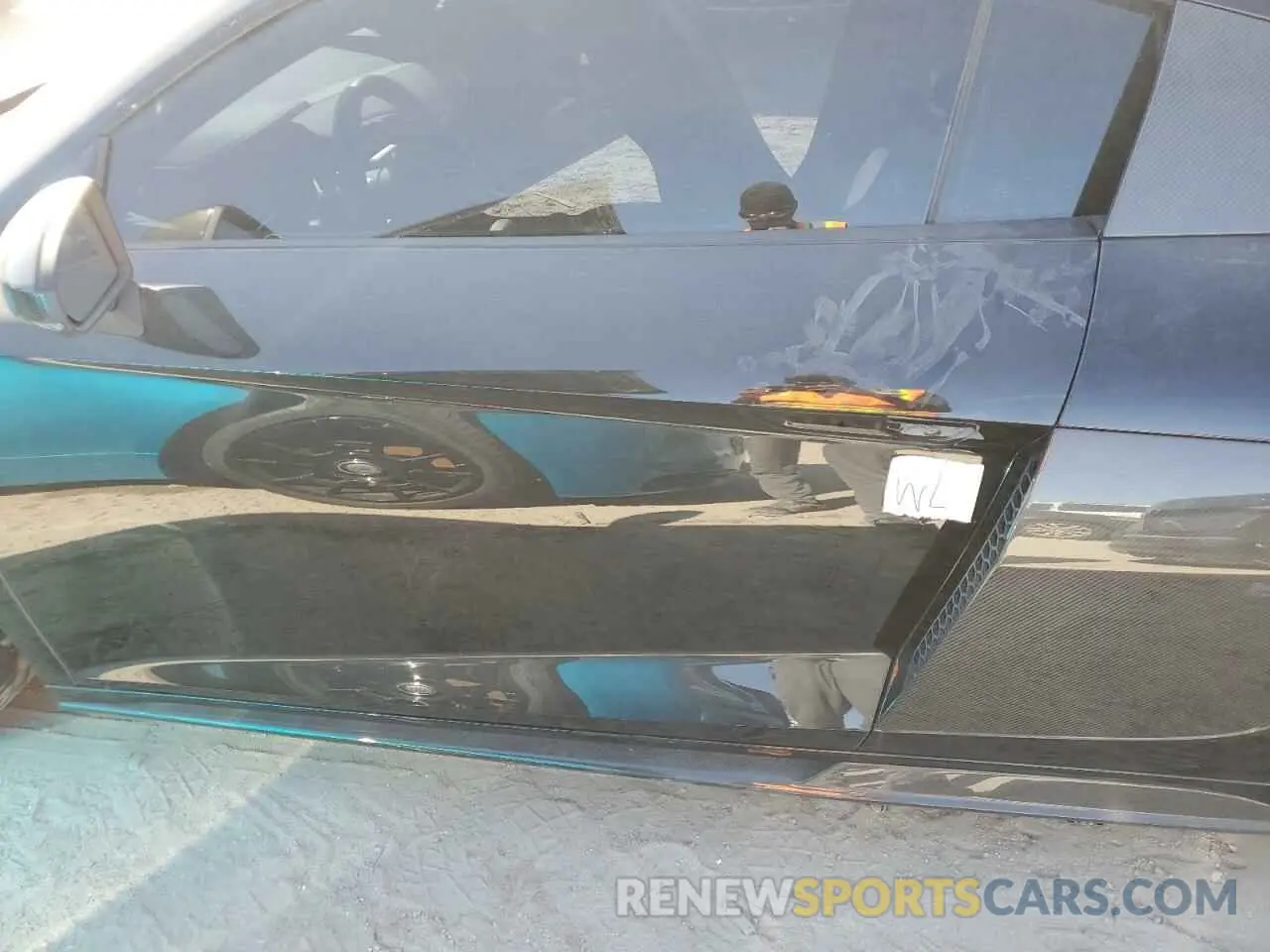 12 Photograph of a damaged car WUAKBAFX6M7901404 AUDI R8 2021