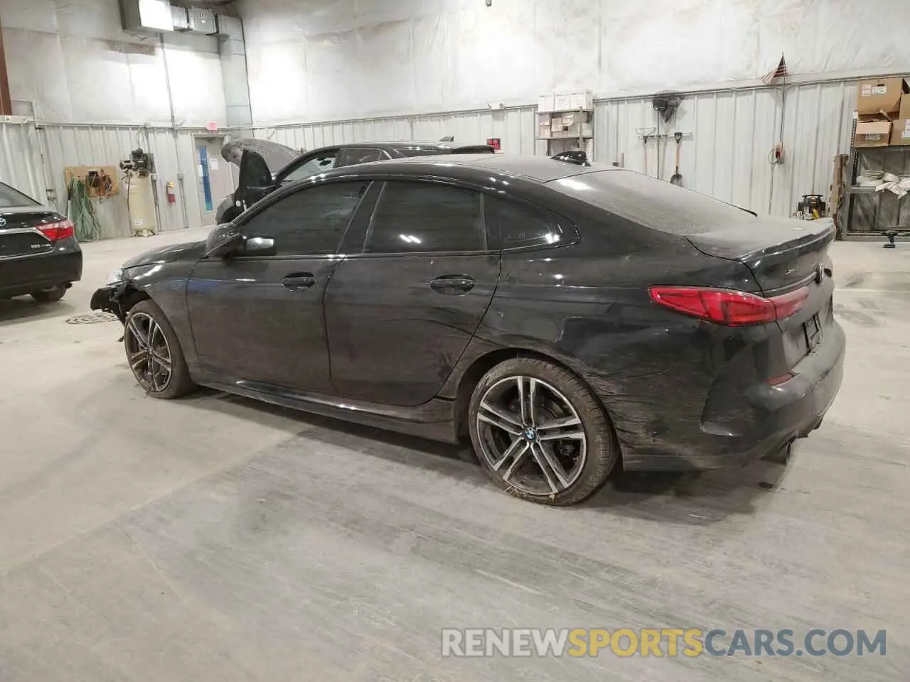 2 Photograph of a damaged car WBA73AK07M7G46464 BMW 2 SERIES 2021