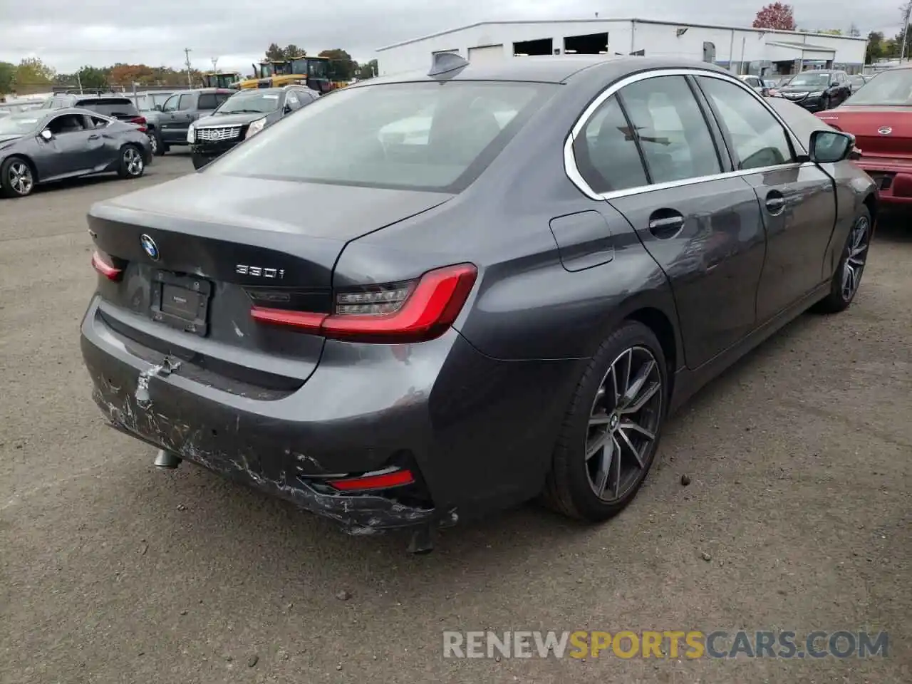 4 Photograph of a damaged car 3MW5R7J51K8B00807 BMW 3 SERIES 2019