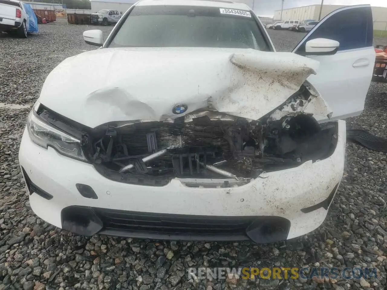 11 Photograph of a damaged car WBA5R1C57KFH11333 BMW 3 SERIES 2019