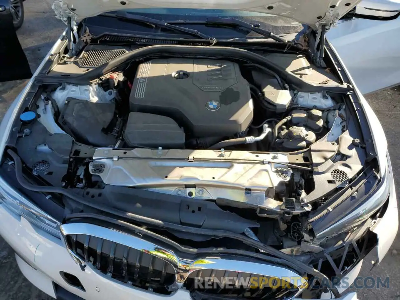 11 Photograph of a damaged car WBA5R1C58KFH11096 BMW 3 SERIES 2019