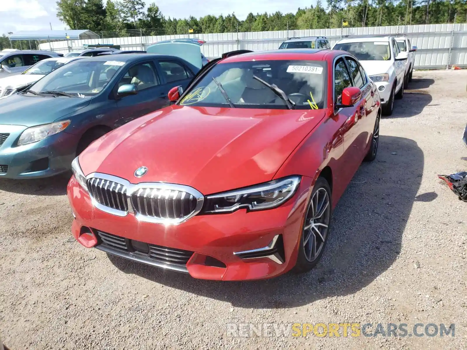 2 Photograph of a damaged car WBA5R1C59KAK07103 BMW 3 SERIES 2019