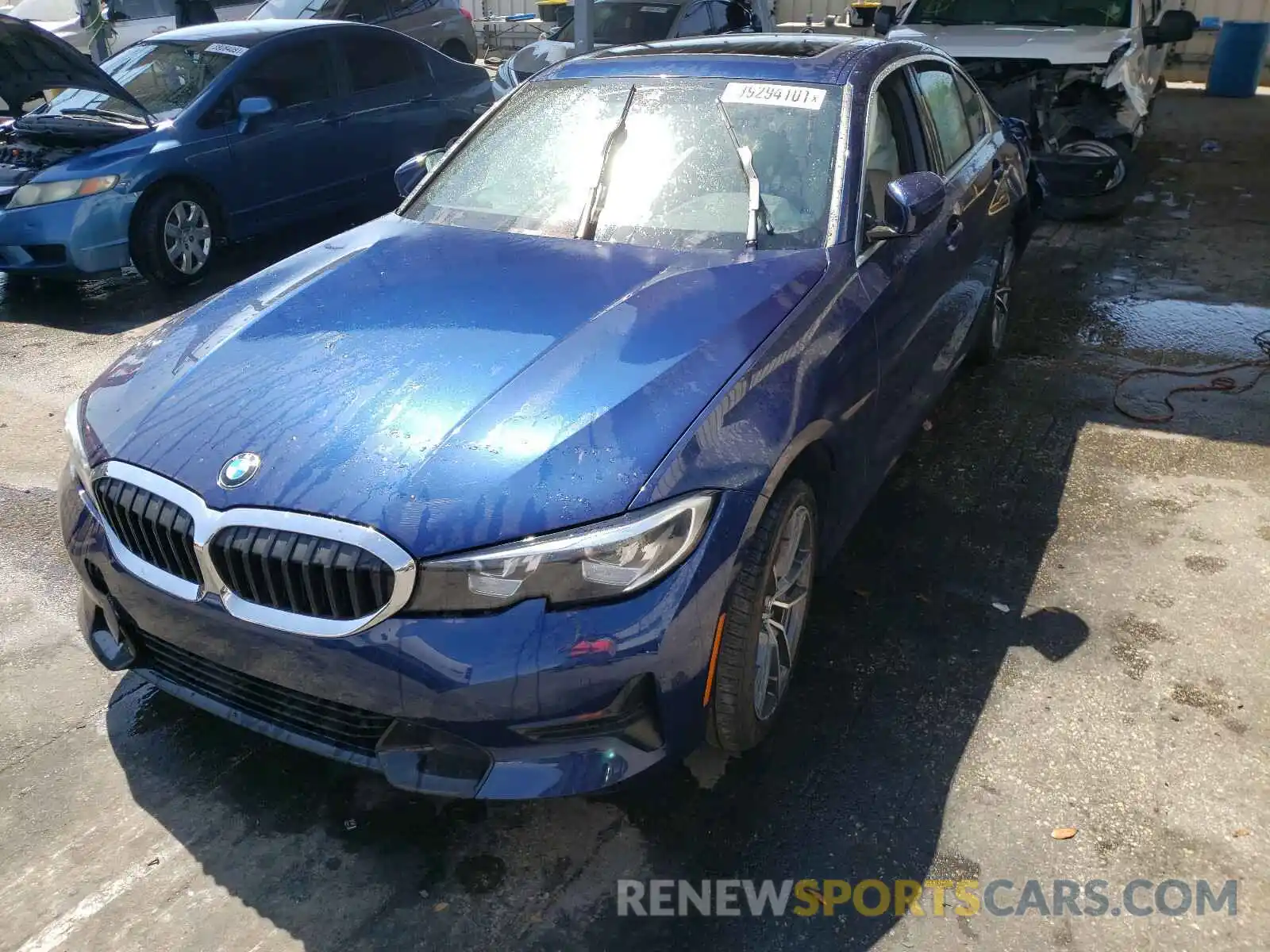 2 Photograph of a damaged car WBA5R1C5XKAK10785 BMW 3 SERIES 2019