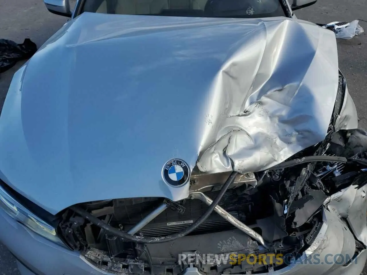 11 Photograph of a damaged car WBA5R1C5XKAK12164 BMW 3 SERIES 2019