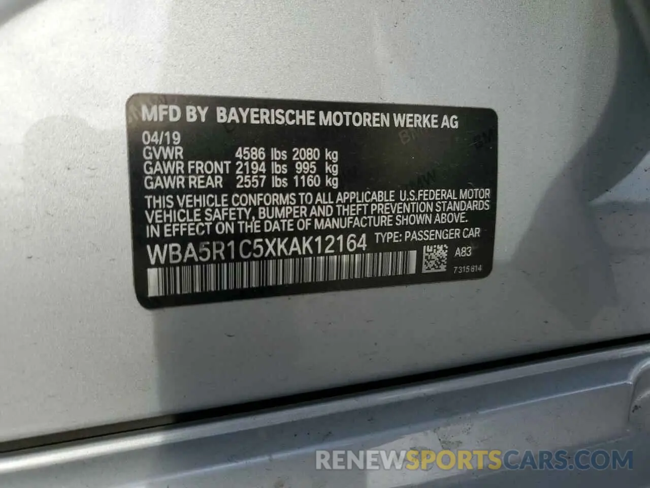 12 Photograph of a damaged car WBA5R1C5XKAK12164 BMW 3 SERIES 2019