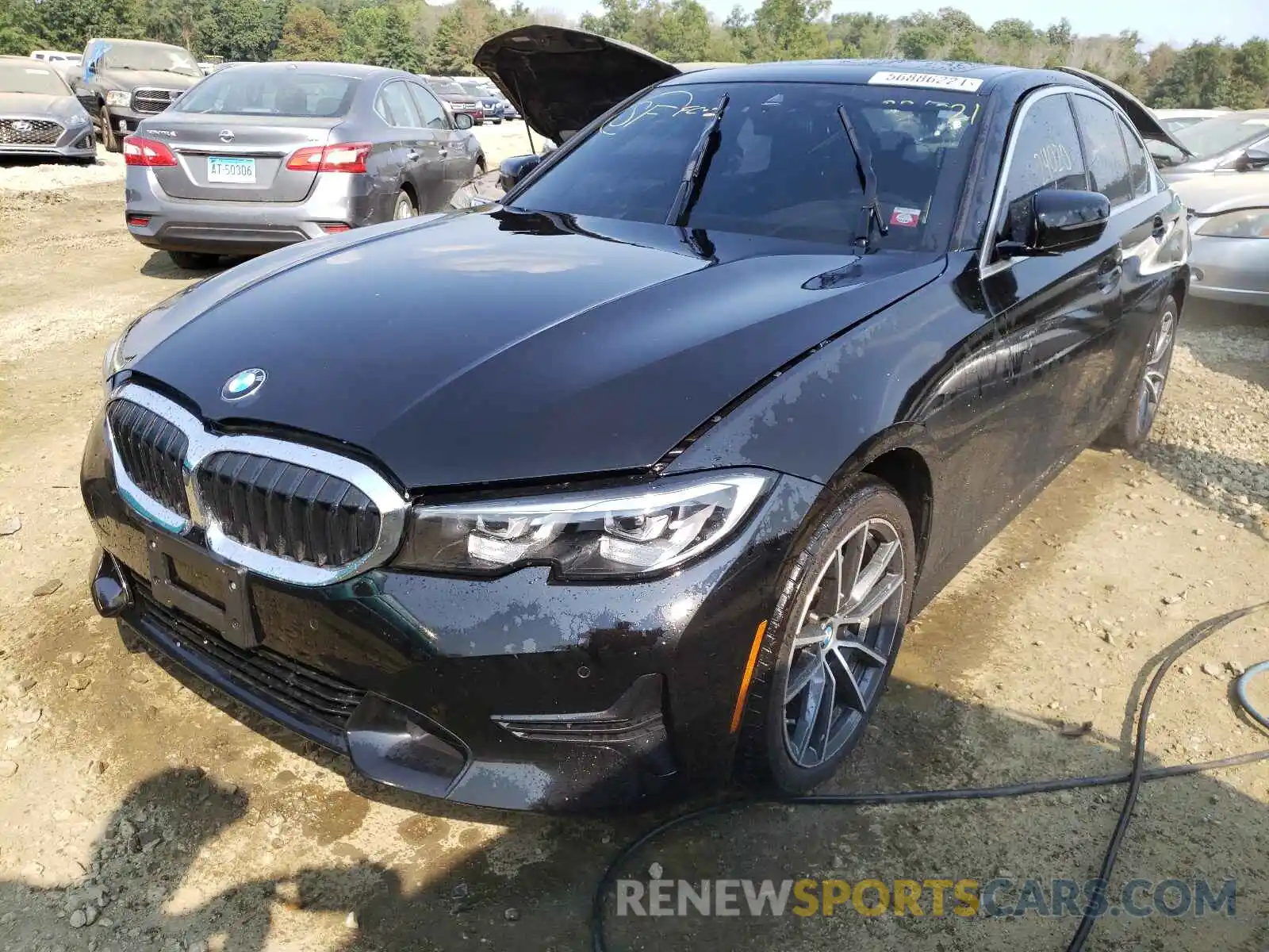 2 Photograph of a damaged car WBA5R7C57KFH09603 BMW 3 SERIES 2019