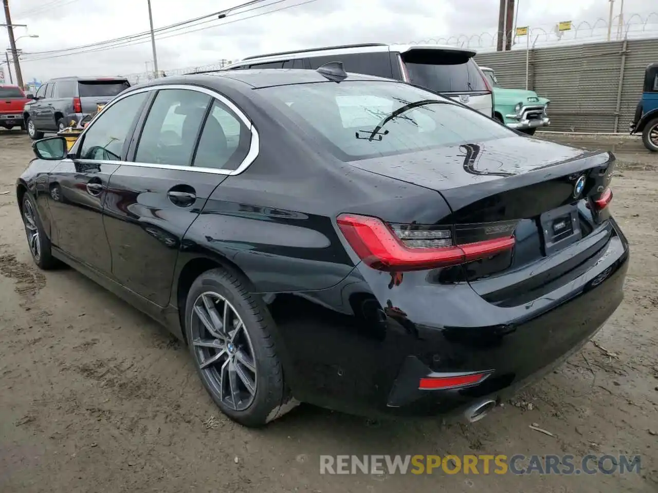 2 Photograph of a damaged car 3MW5P7J01M8B72345 BMW 3 SERIES 2021