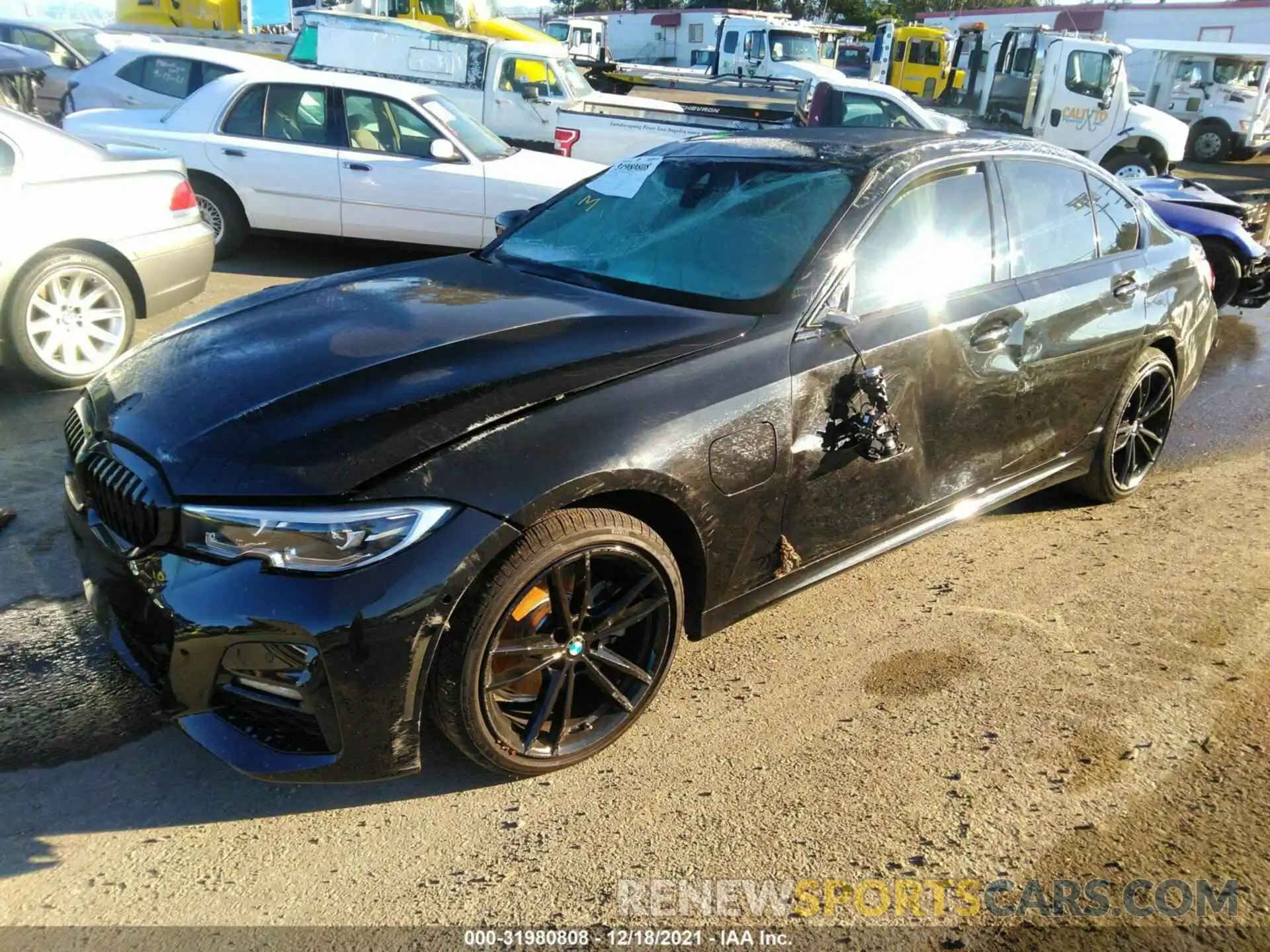 2 Photograph of a damaged car 3MW5P7J05M8B79962 BMW 3 SERIES 2021