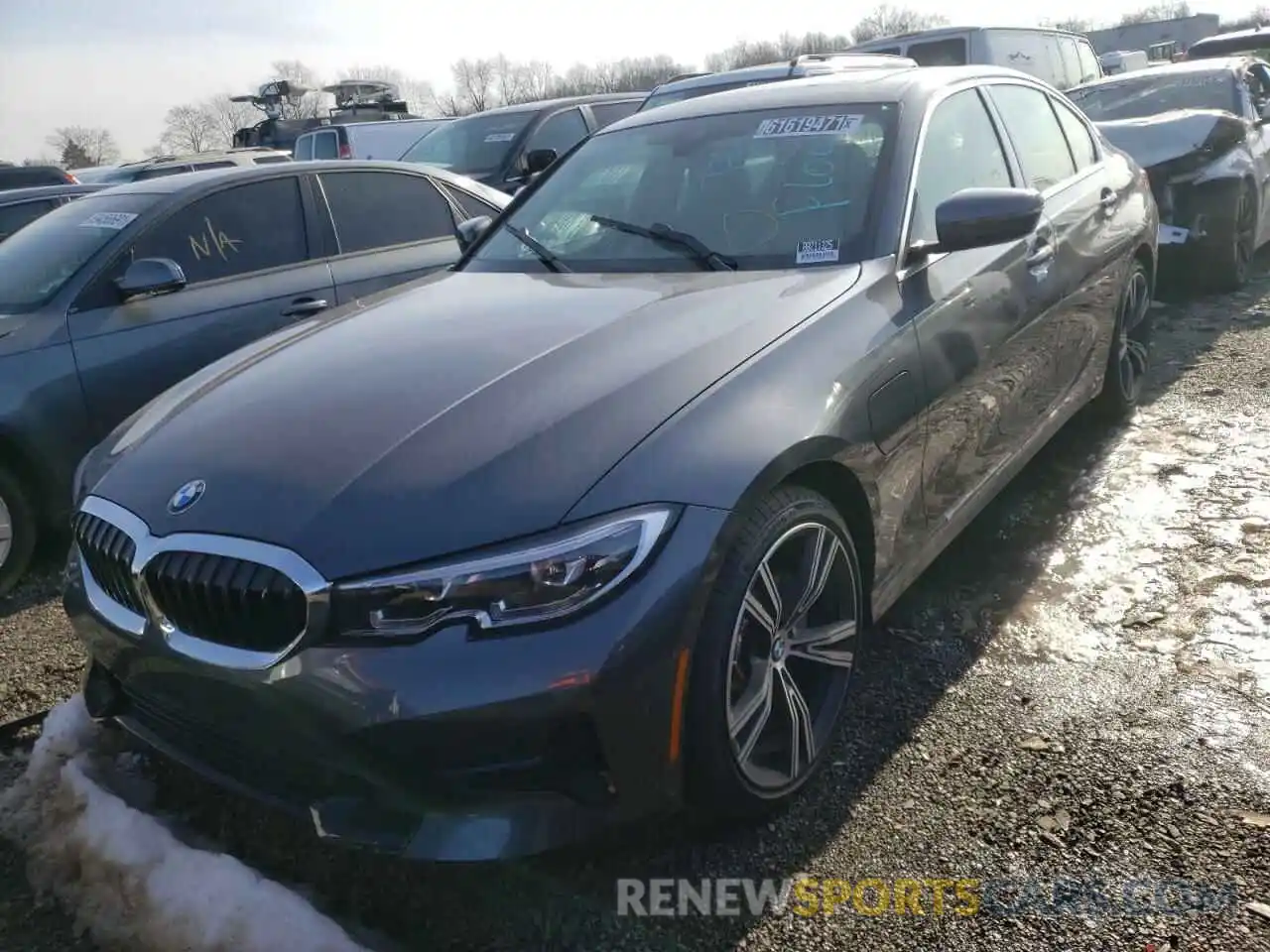 2 Photograph of a damaged car 3MW5P9J04M8C17189 BMW 3 SERIES 2021