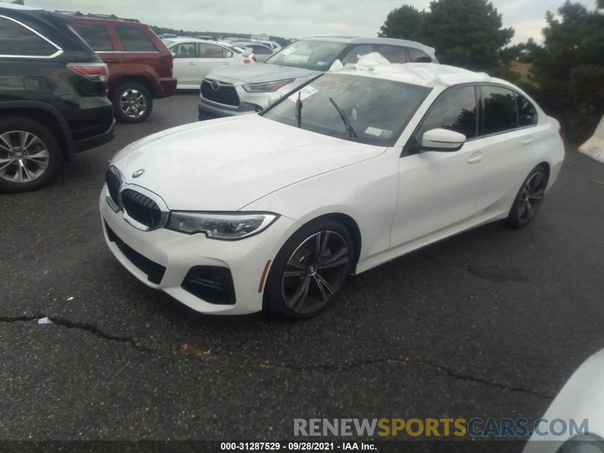 2 Photograph of a damaged car 3MW5R7J00M8B72573 BMW 3 SERIES 2021