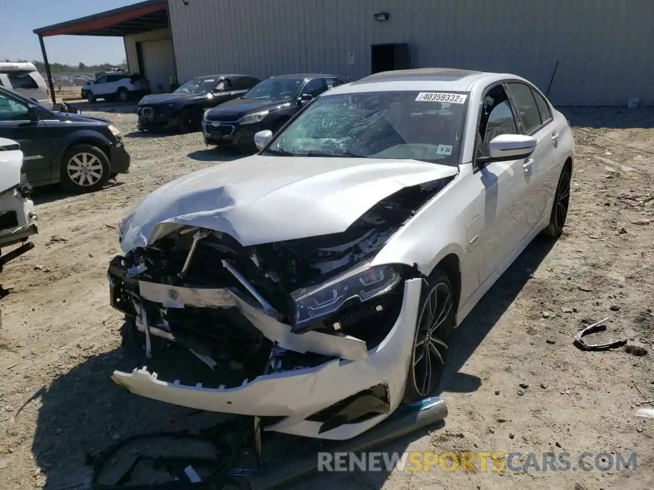 2 Photograph of a damaged car 3MW5P9J04N8C23575 BMW 3 SERIES 2022