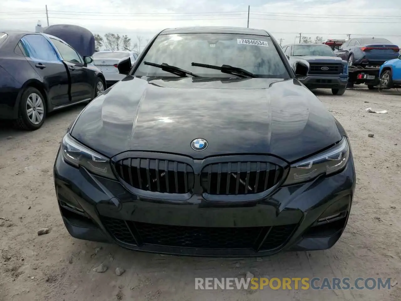 5 Photograph of a damaged car 3MW5R1J0XN8C38514 BMW 3 SERIES 2022