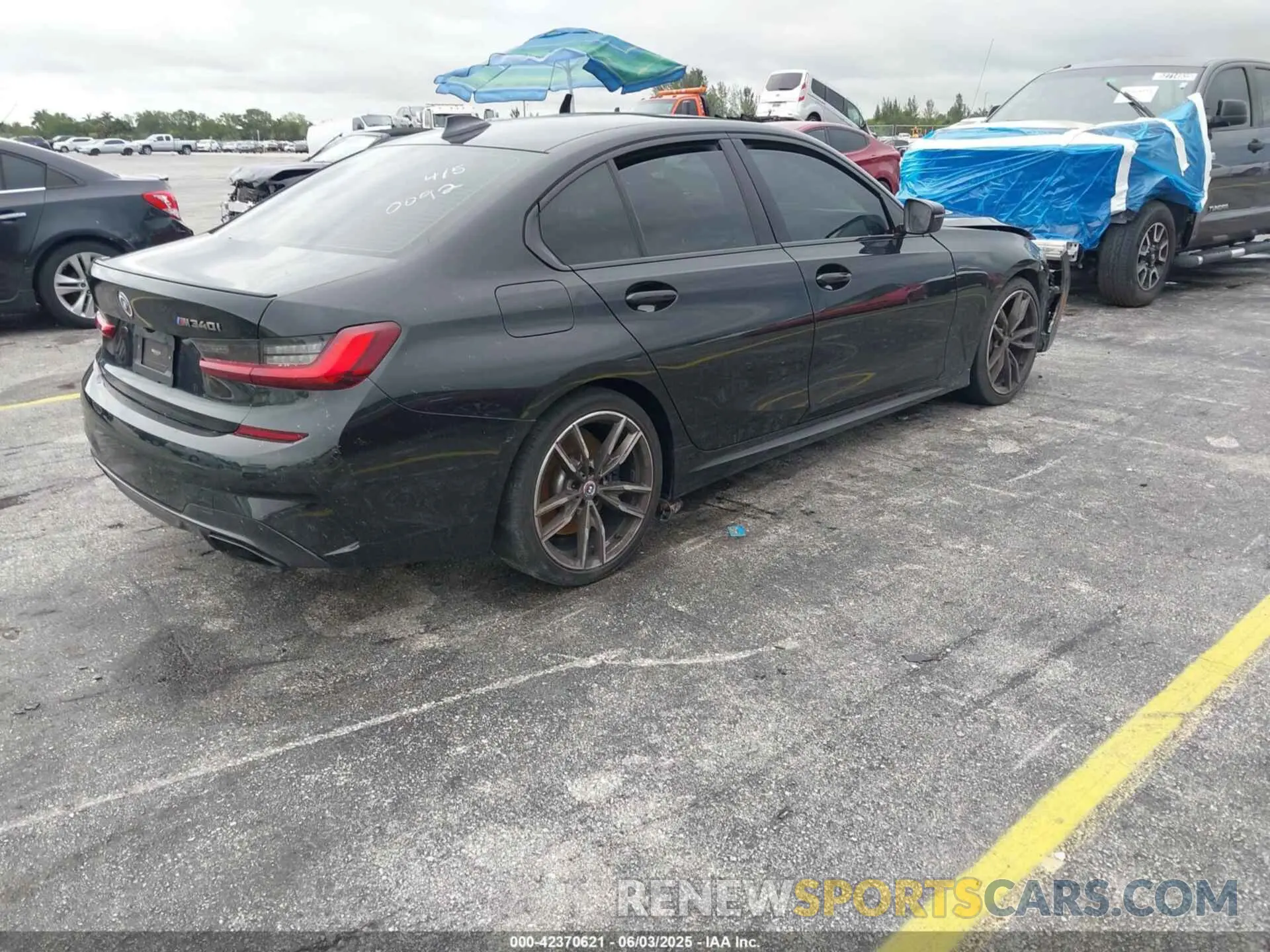 4 Photograph of a damaged car 3MW5U7J03N8C70092 BMW 3 SERIES 2022