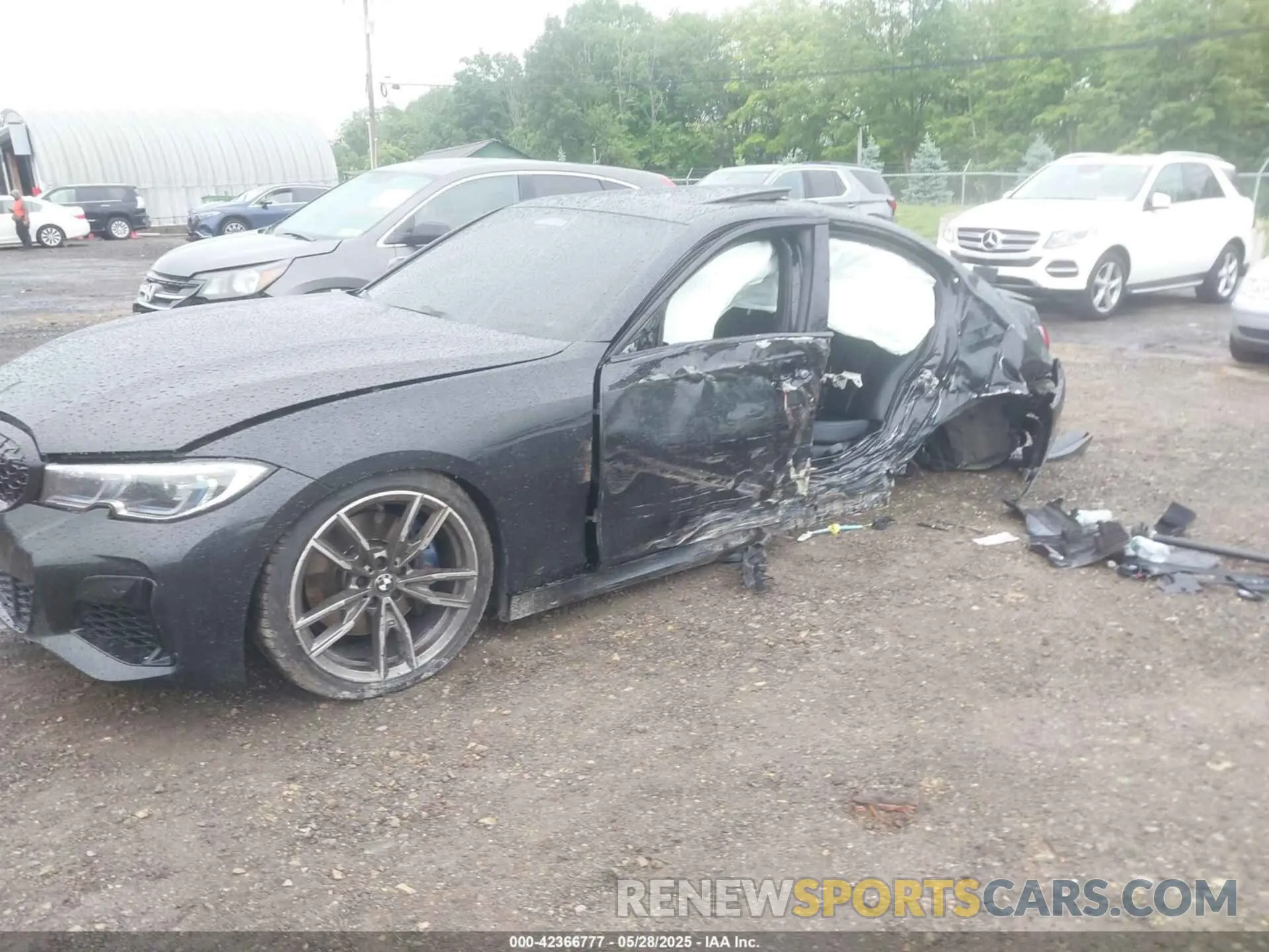 6 Photograph of a damaged car 3MW5U9J00N8C24859 BMW 3 SERIES 2022