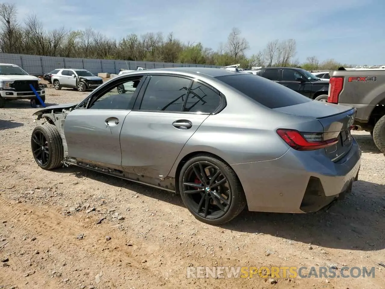2 Photograph of a damaged car 3MW69FF00P8D51885 BMW 3 SERIES 2023