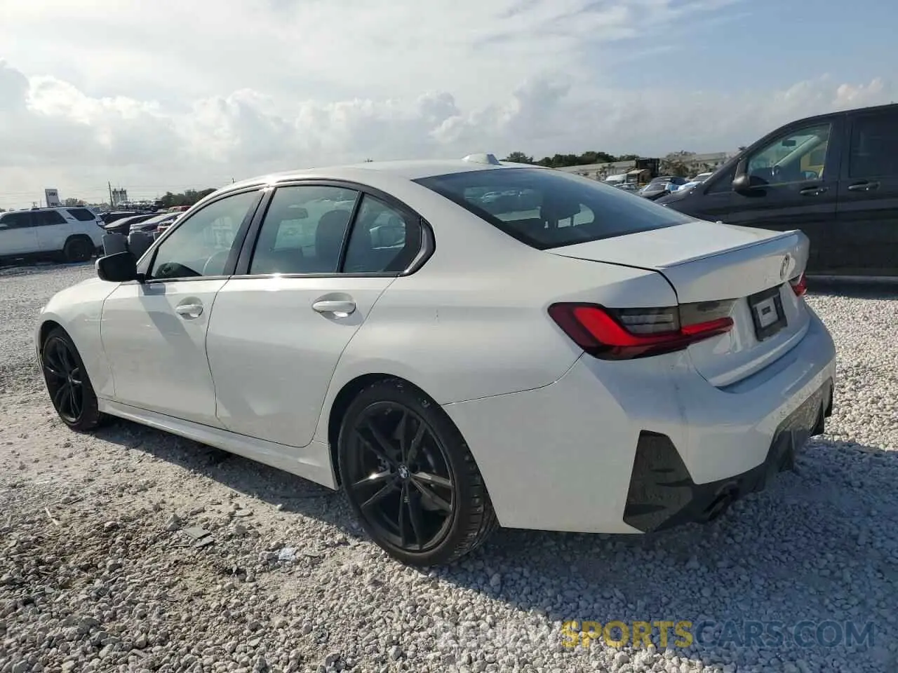2 Photograph of a damaged car 3MW69FF0XP8D71173 BMW 3 SERIES 2023