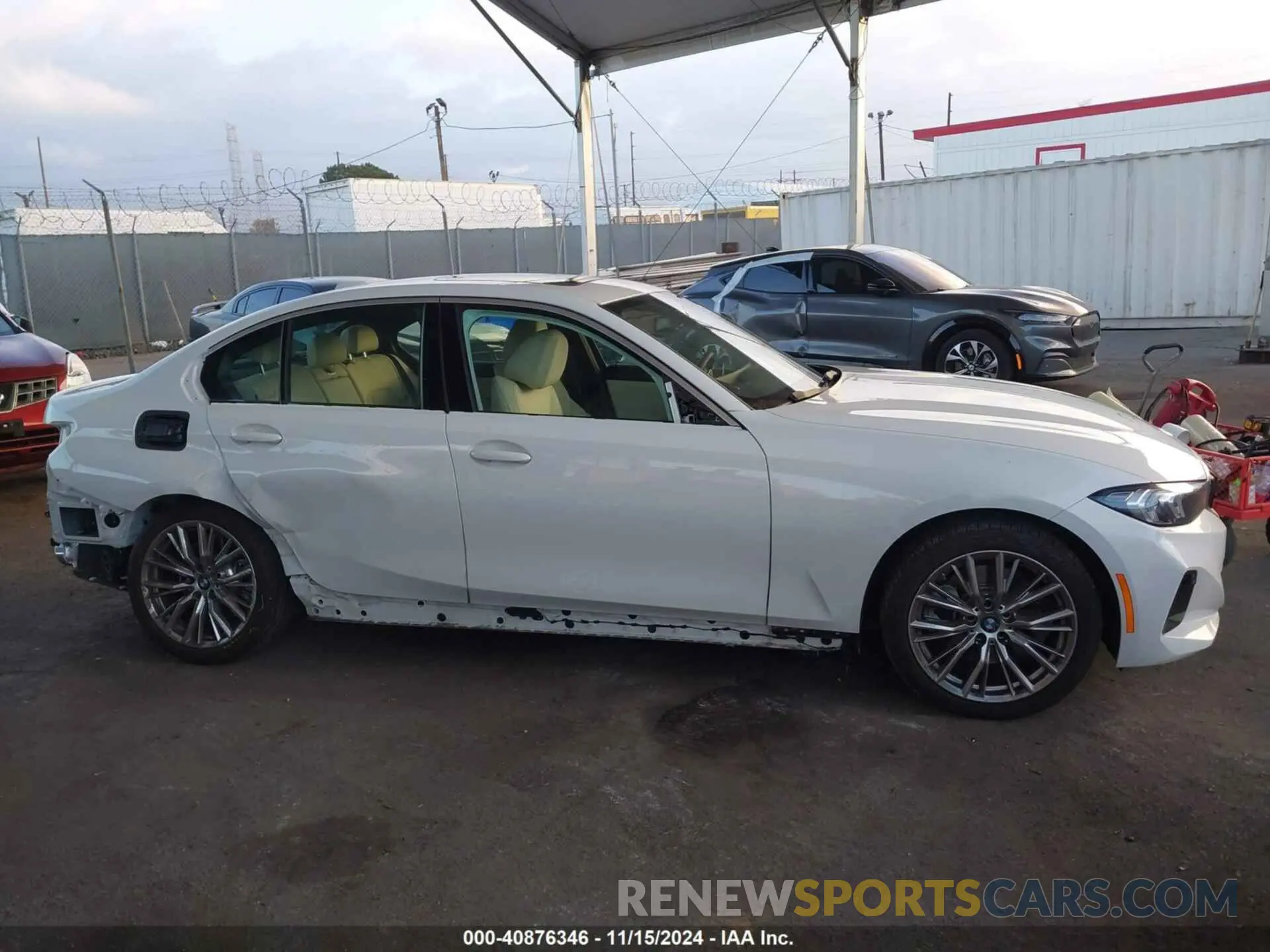 14 Photograph of a damaged car 3MW69FF02R8E04394 BMW 3 SERIES 2024