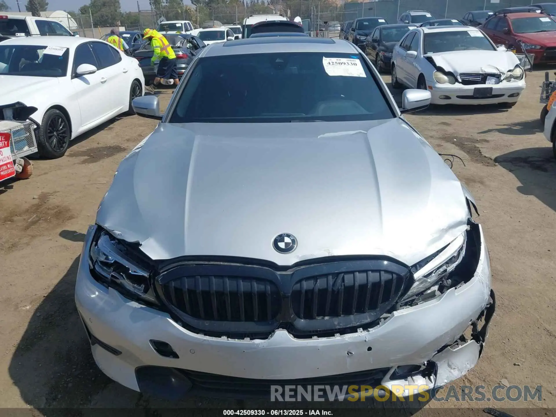12 Photograph of a damaged car WBA5R1C50KAK12383 BMW 330I 2019
