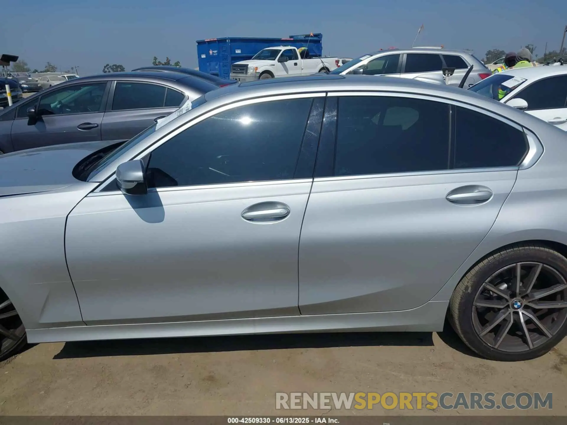14 Photograph of a damaged car WBA5R1C50KAK12383 BMW 330I 2019