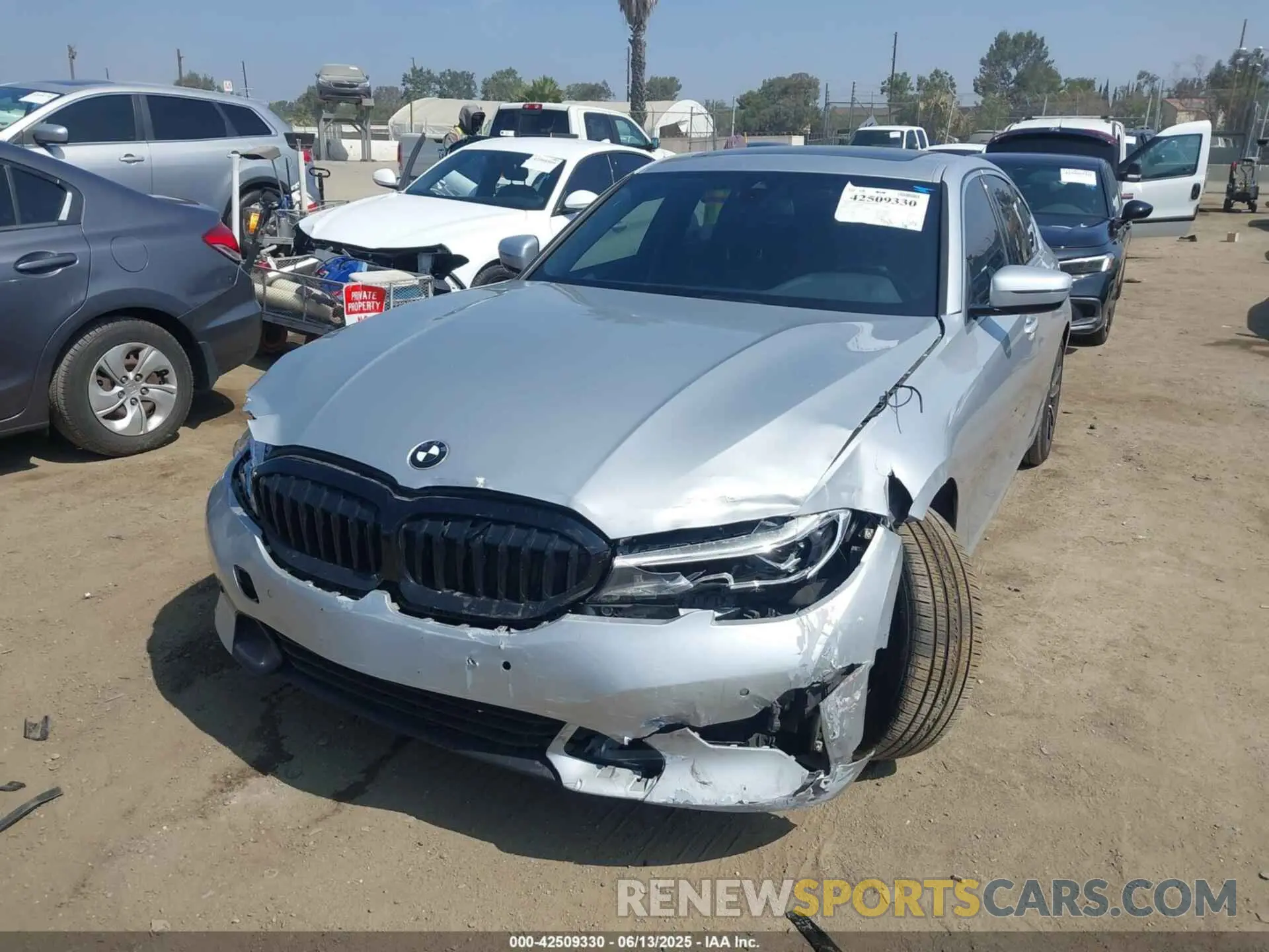 2 Photograph of a damaged car WBA5R1C50KAK12383 BMW 330I 2019