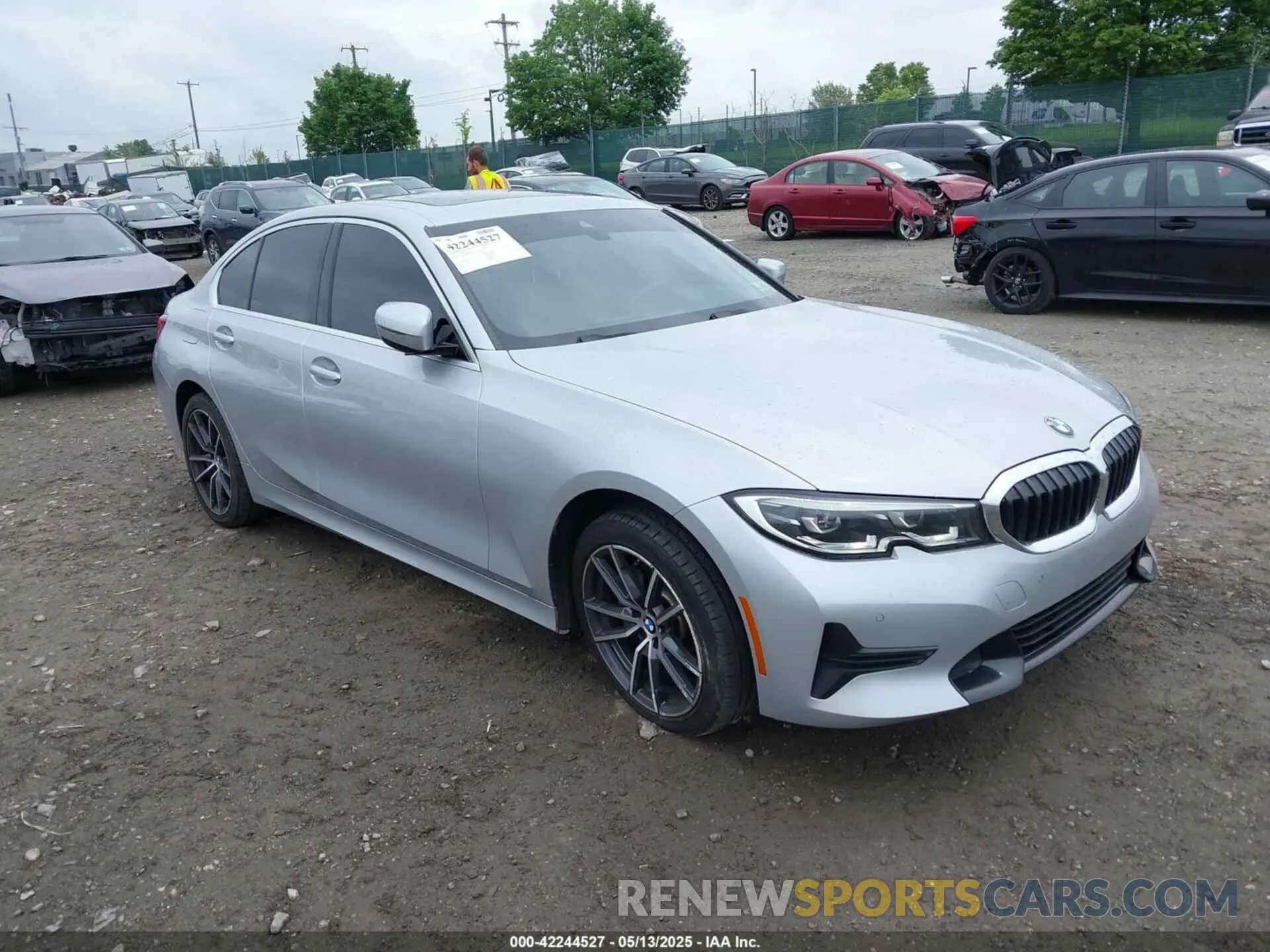 1 Photograph of a damaged car WBA5R1C54KAK10233 BMW 330I 2019