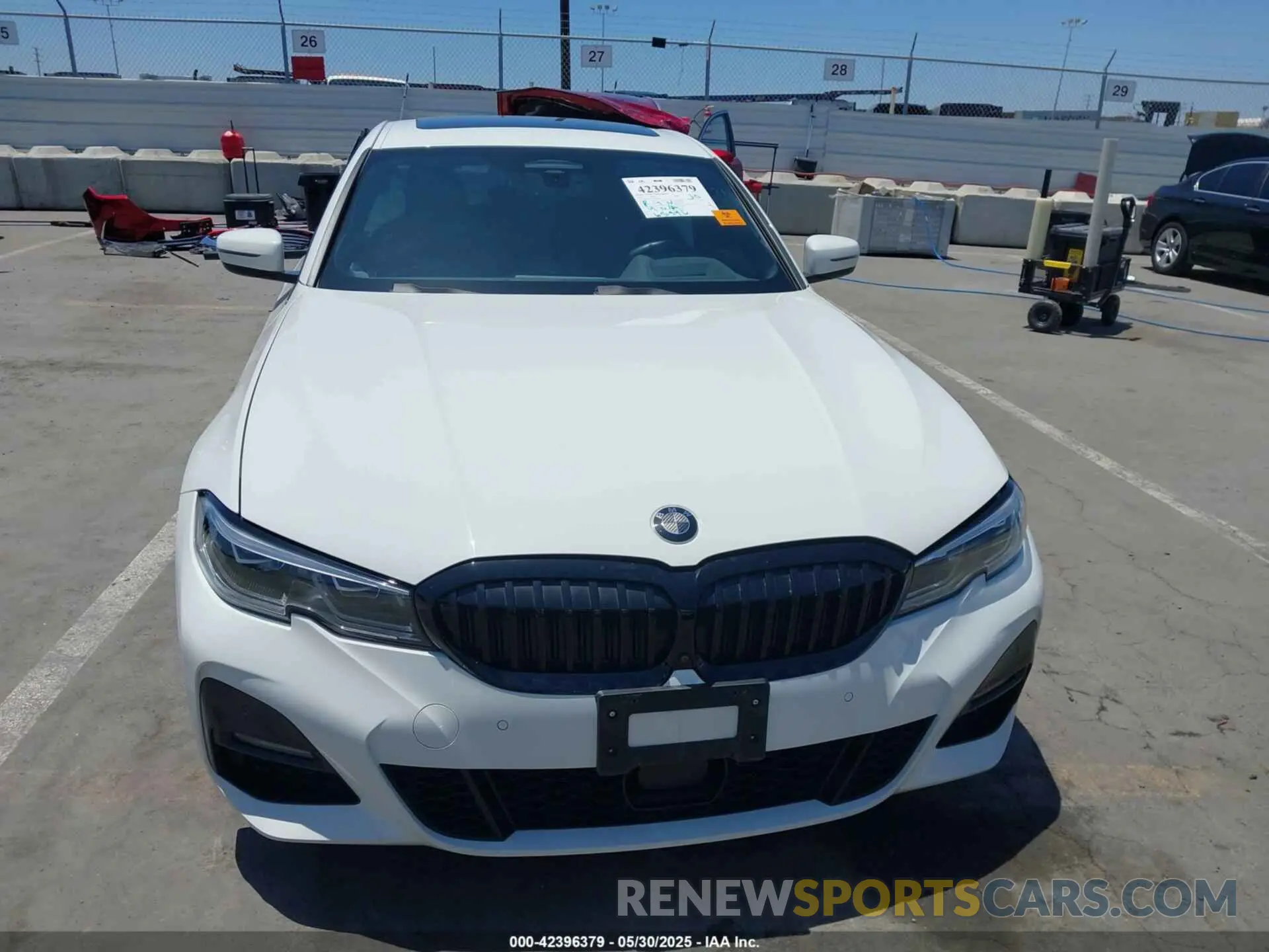 12 Photograph of a damaged car WBA5R1C55KAJ98934 BMW 330I 2019