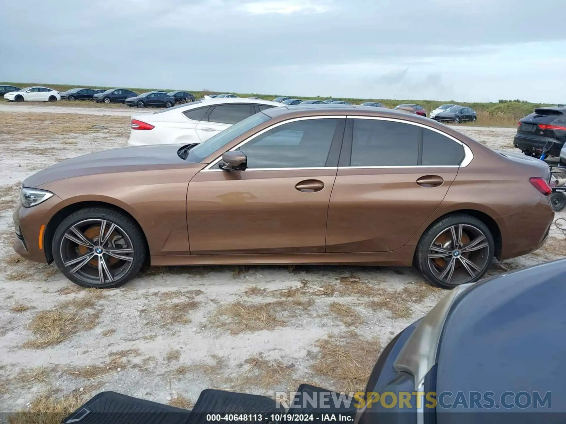 14 Photograph of a damaged car WBA5R1C59KAJ98550 BMW 330I 2019