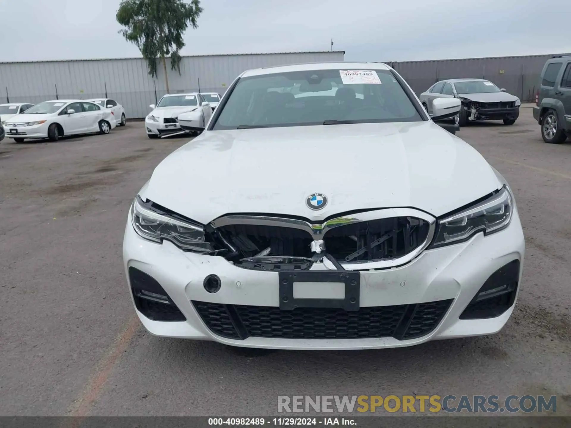 11 Photograph of a damaged car WBA5R1C59KAK07571 BMW 330I 2019