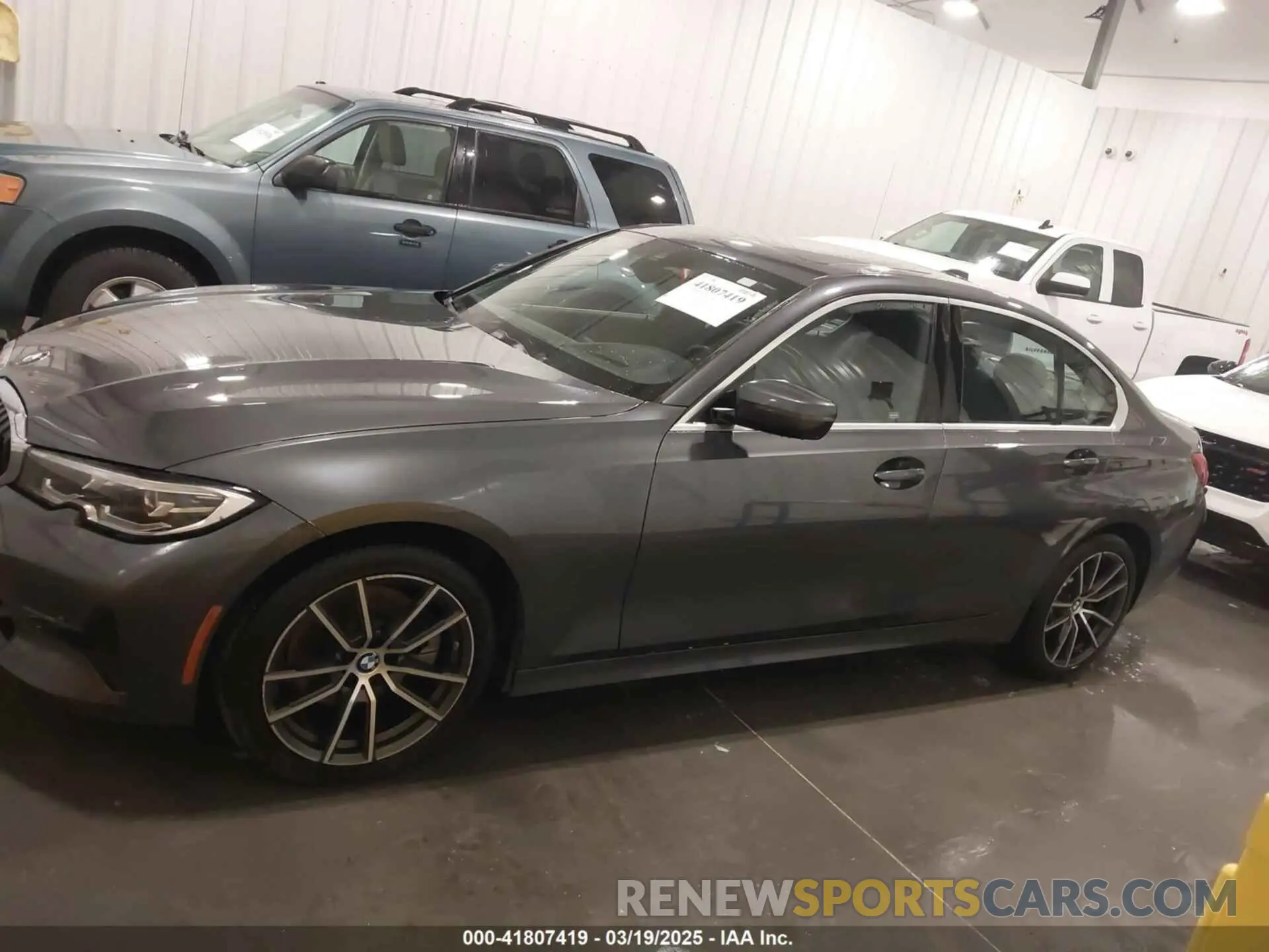 14 Photograph of a damaged car WBA5R7C57KAJ80356 BMW 330I 2019