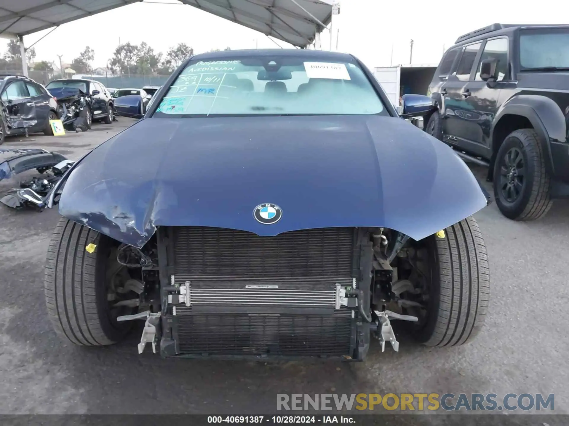 13 Photograph of a damaged car 3MW5R1J00L8B14250 BMW 330I 2020