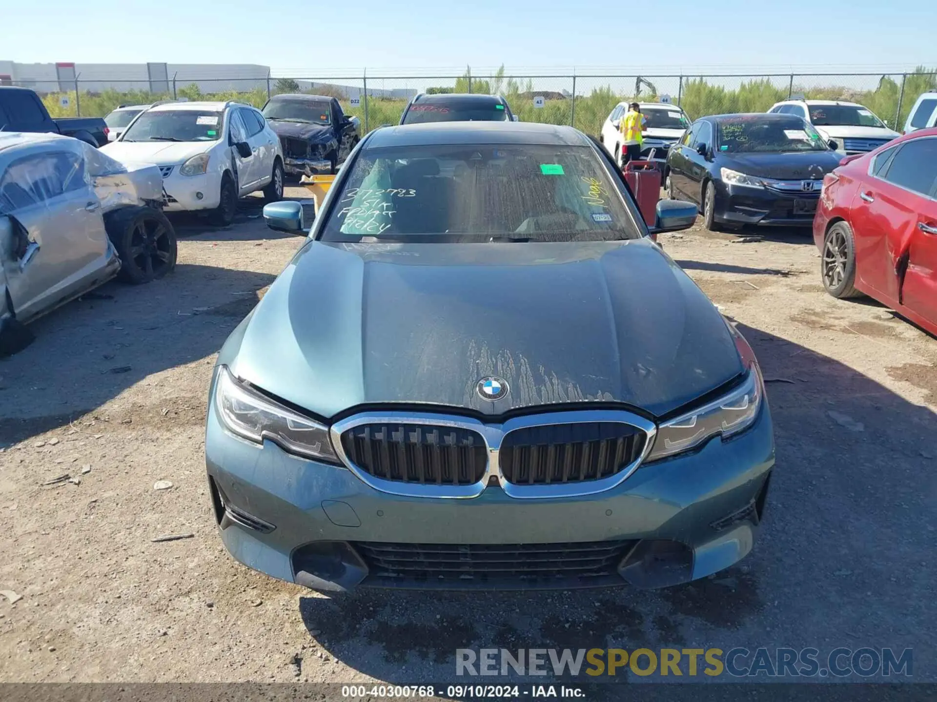 12 Photograph of a damaged car 3MW5R1J01M8B73194 BMW 330I 2021