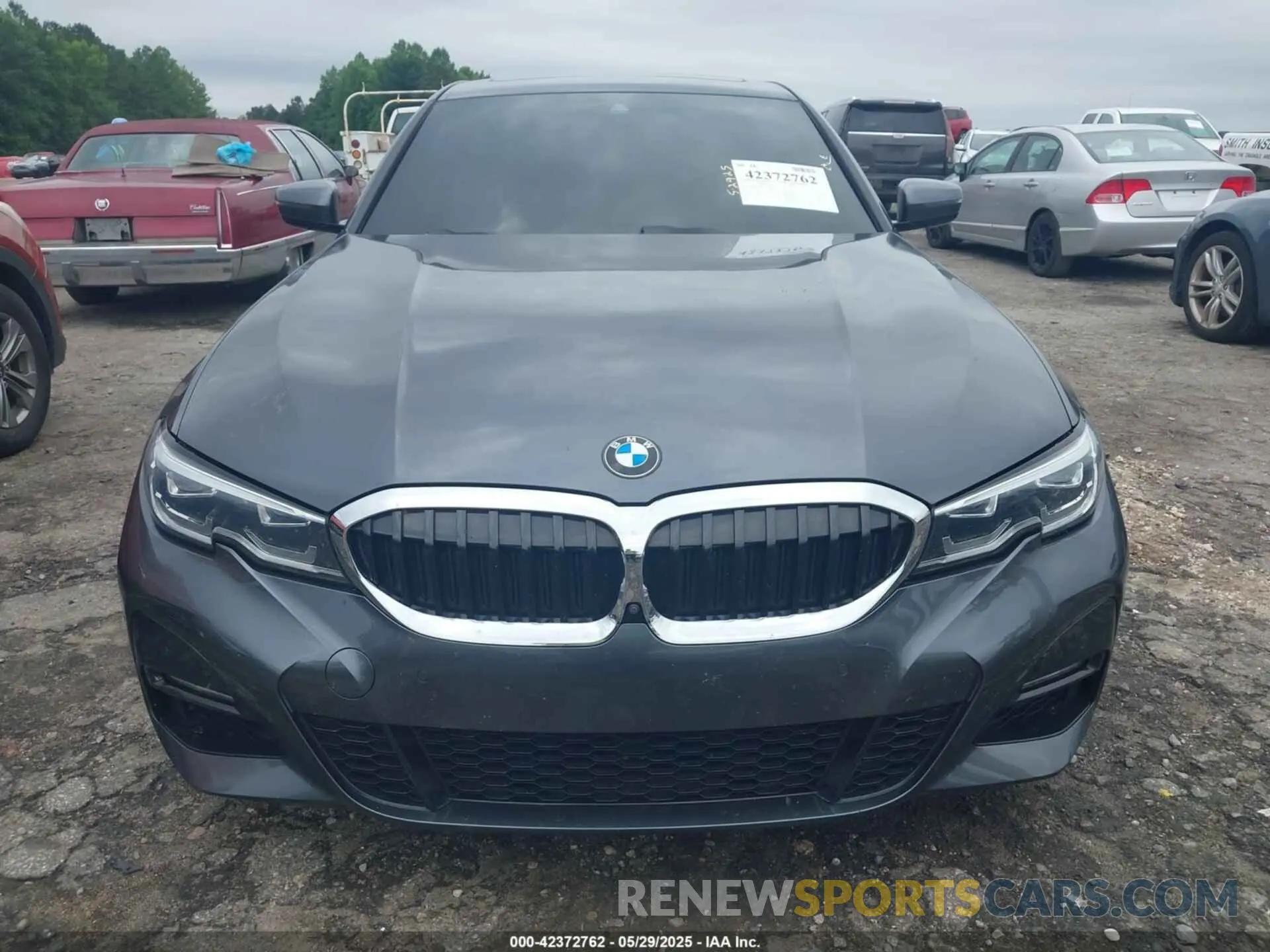 12 Photograph of a damaged car 3MW5R1J05M8B79581 BMW 330I 2021