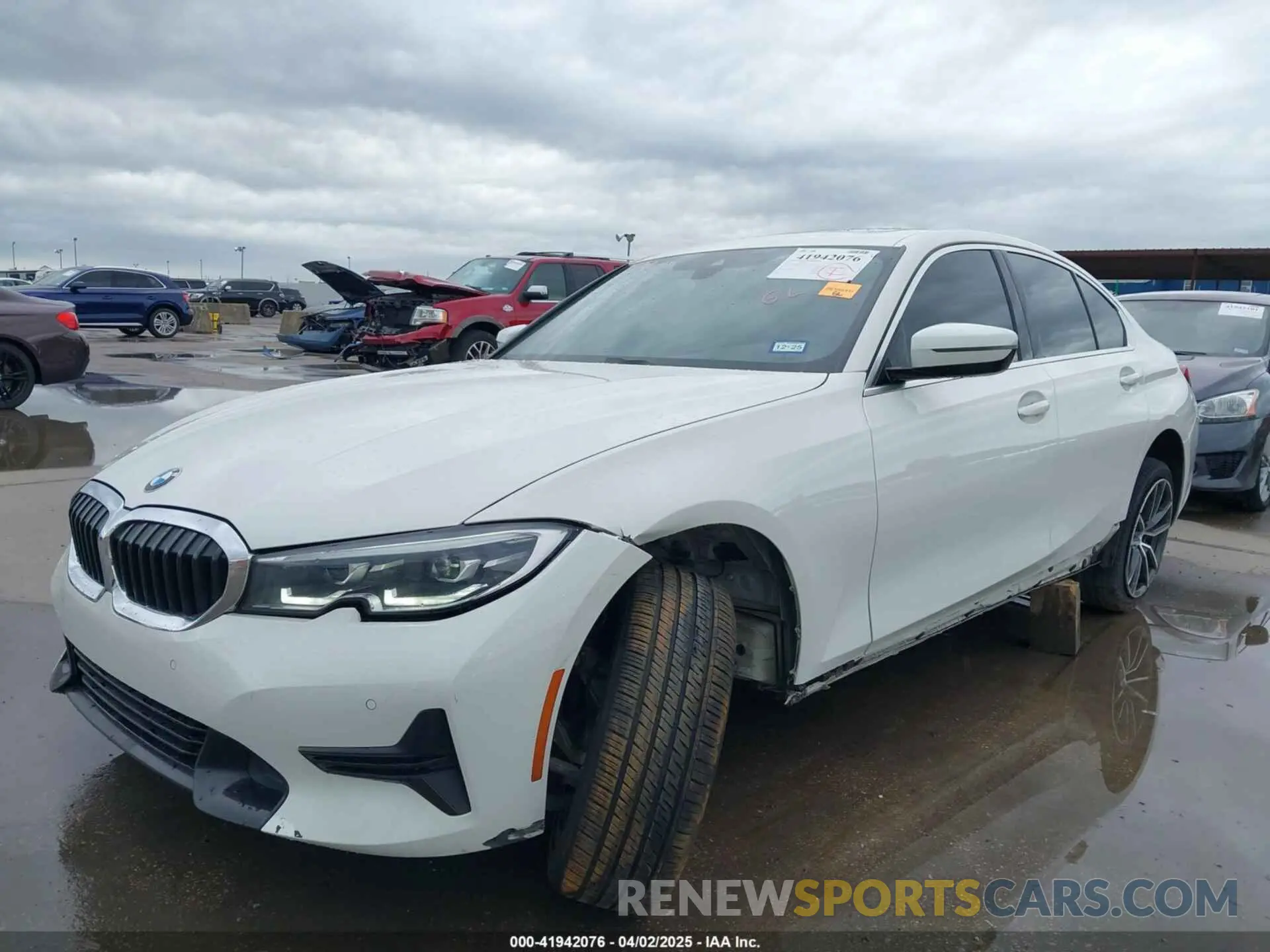 19 Photograph of a damaged car 3MW5R1J06M8B90668 BMW 330I 2021