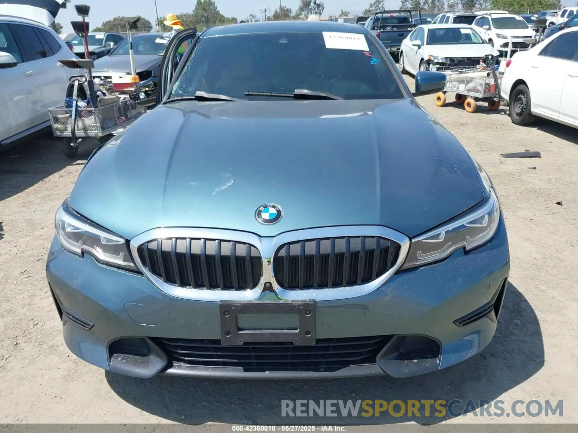 12 Photograph of a damaged car 3MW5R1J07M8B97158 BMW 330I 2021