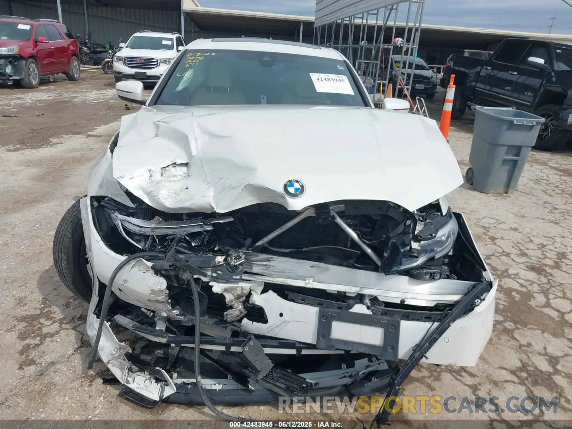12 Photograph of a damaged car 3MW5R1J09M8C08399 BMW 330I 2021
