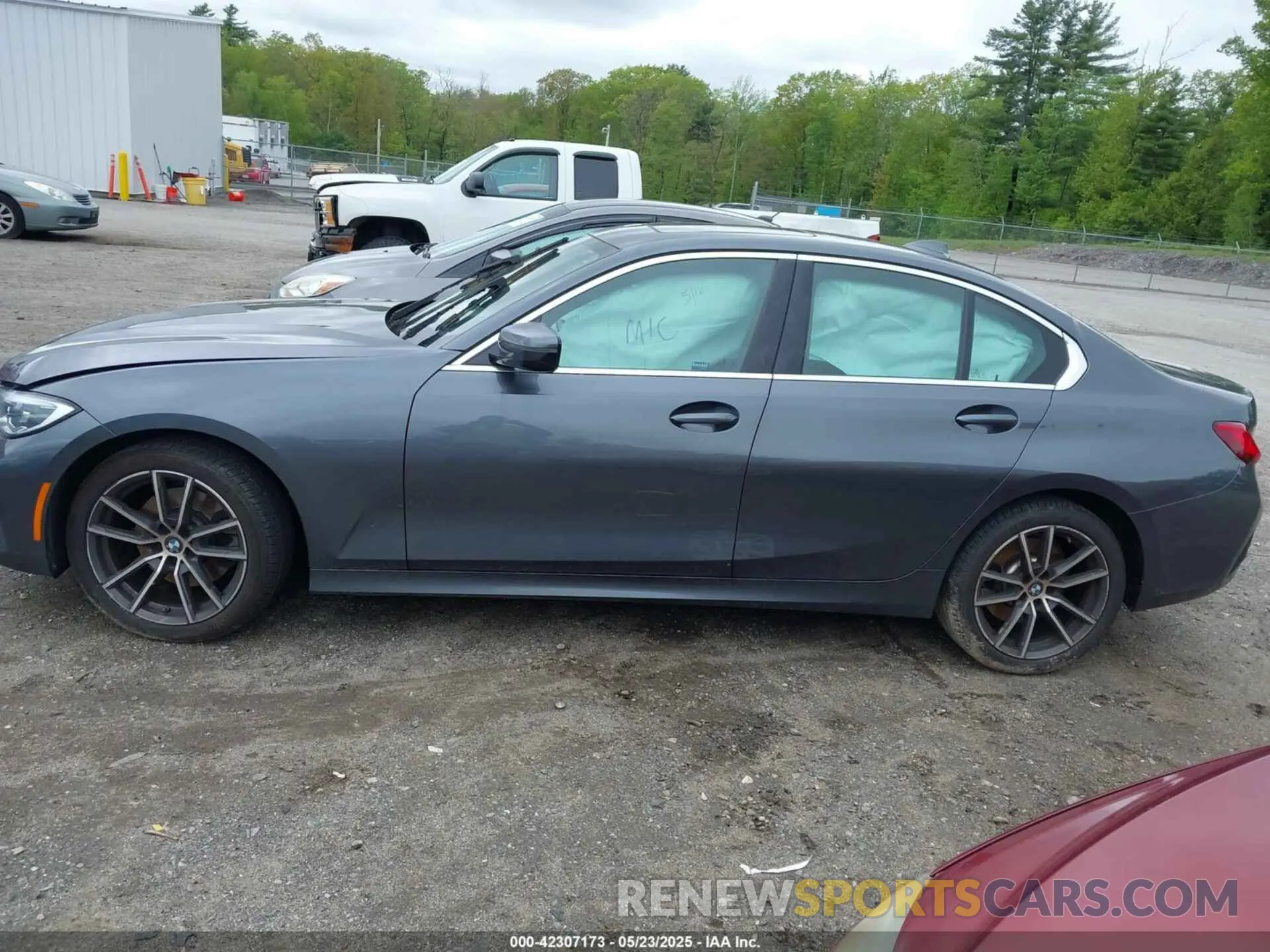 14 Photograph of a damaged car 3MW5R7J01M8B94131 BMW 330I 2021
