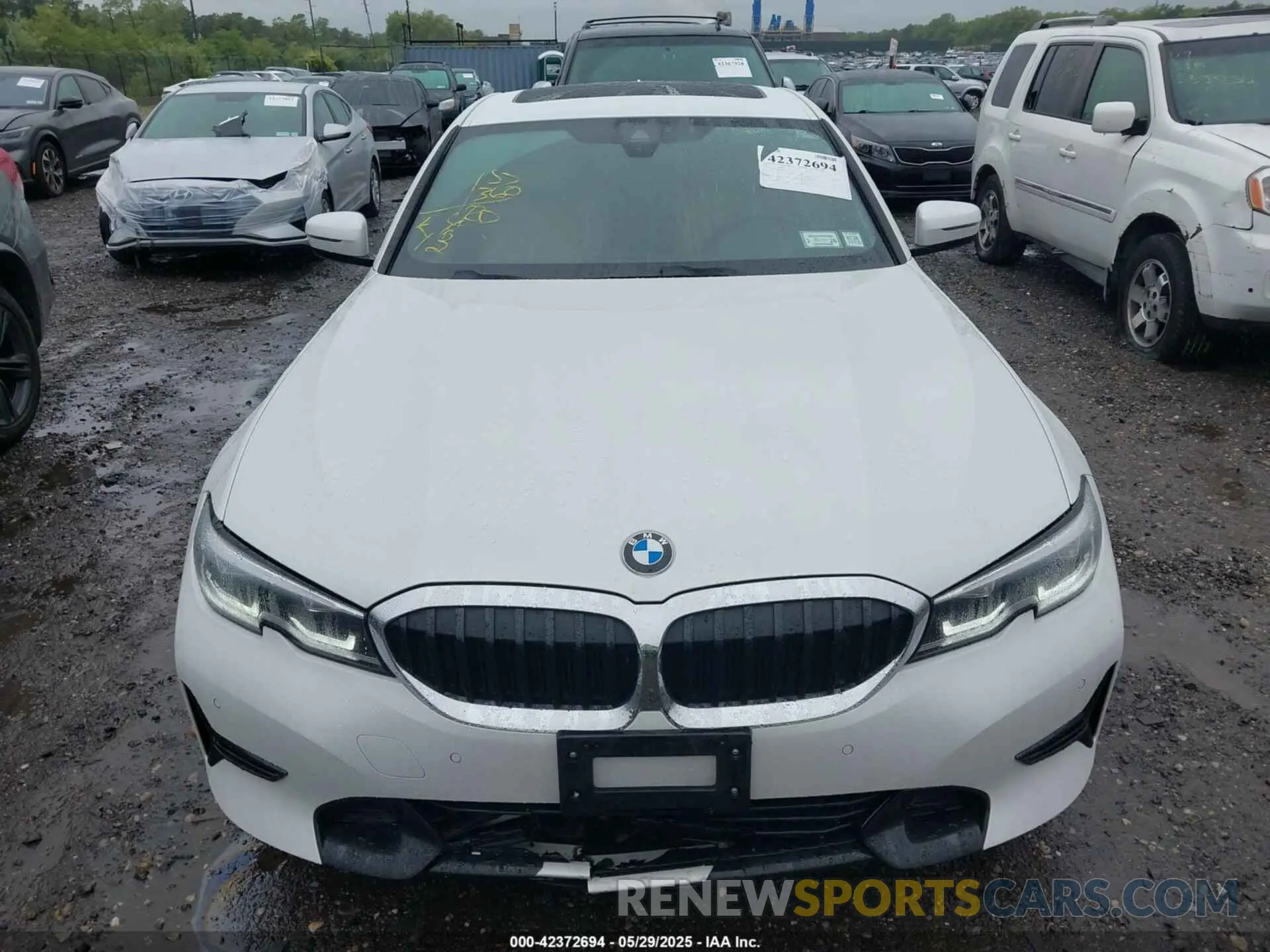 12 Photograph of a damaged car 3MW5R7J07M8B73428 BMW 330I 2021