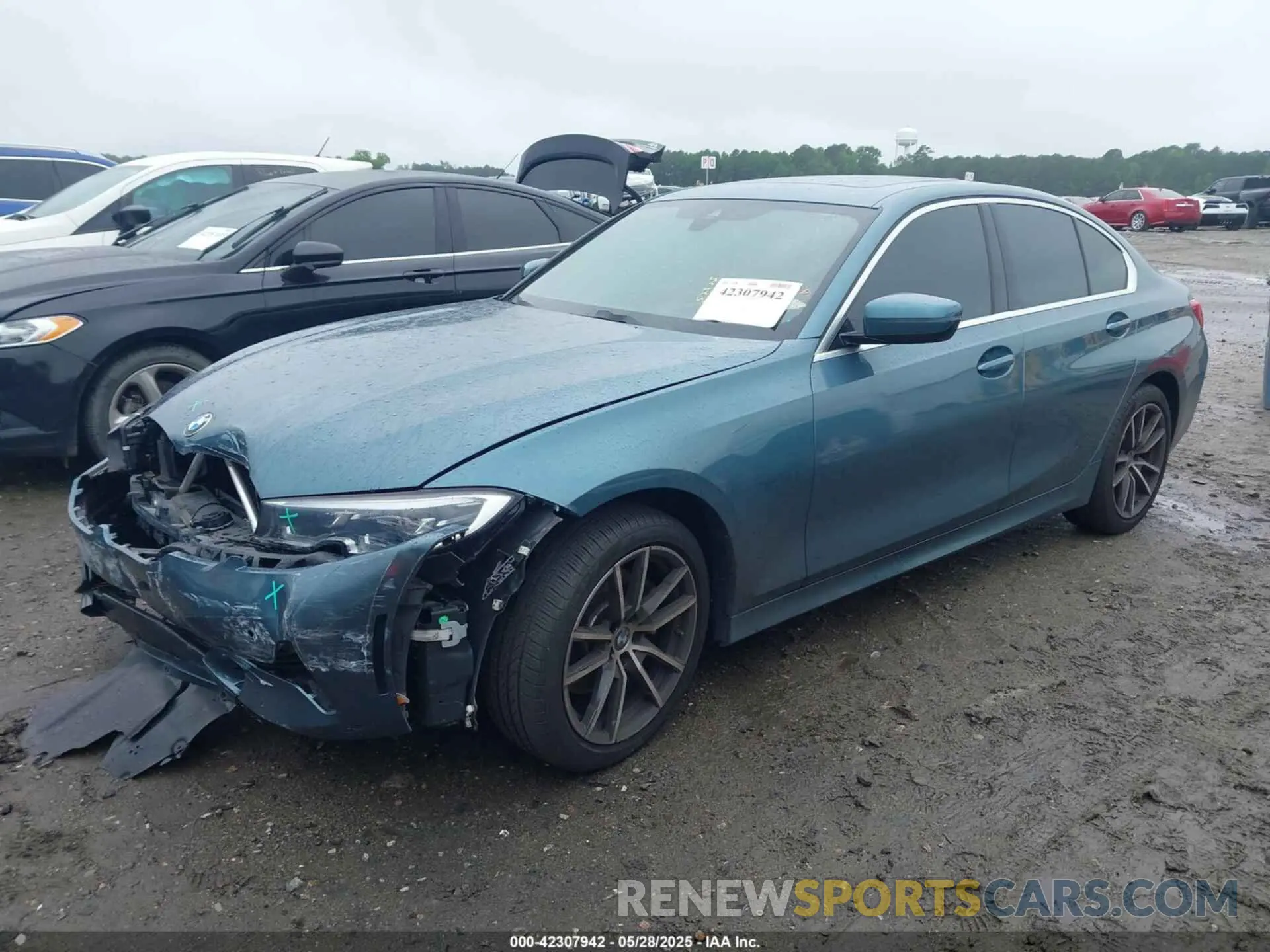 2 Photograph of a damaged car 3MW5R7J07M8C10347 BMW 330I 2021